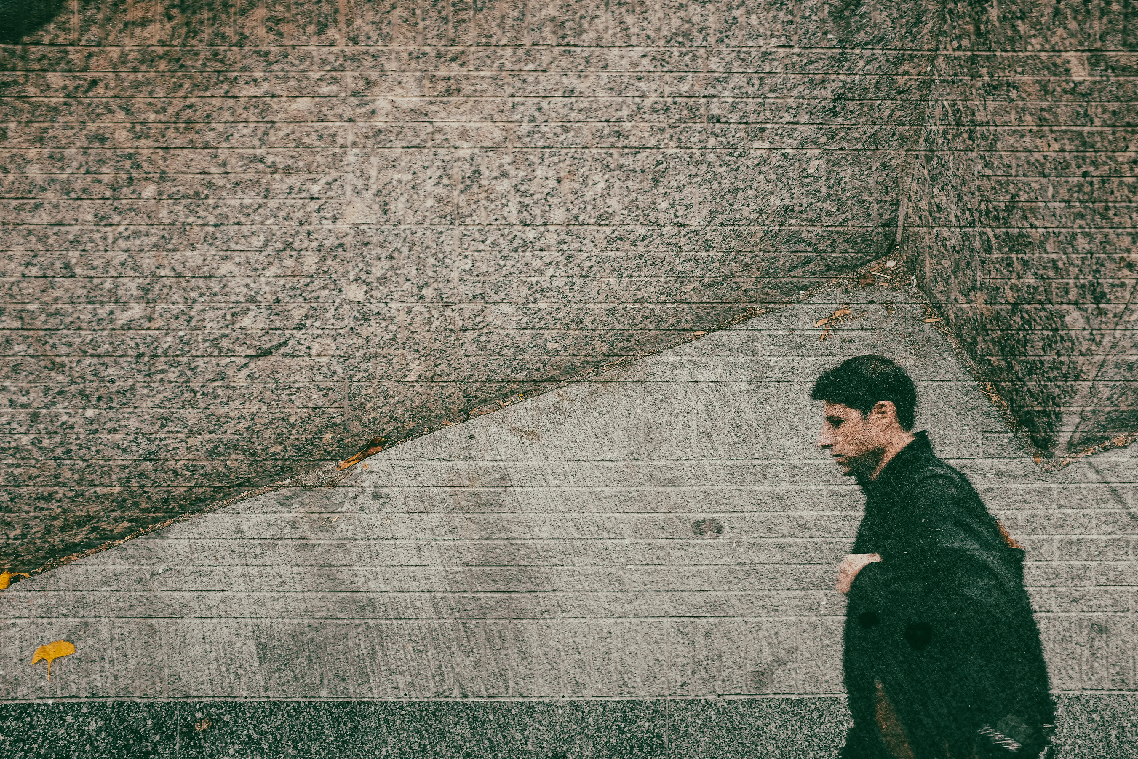 The City is engraved in its inhabitants, who in turn engrave themselves unto each other, not knowing how, when, or why. Identities disappear, dissipate and dilute into the roaring crowd. One question clouds my mind as I stand still observing through my camera’s big wide eye: Will it swallow me whole? Will we become one? One more tag on the wall? One more chewing gum on the ground, stepped on by the weight of the mass, becoming thus the texture of every day, of everyone?