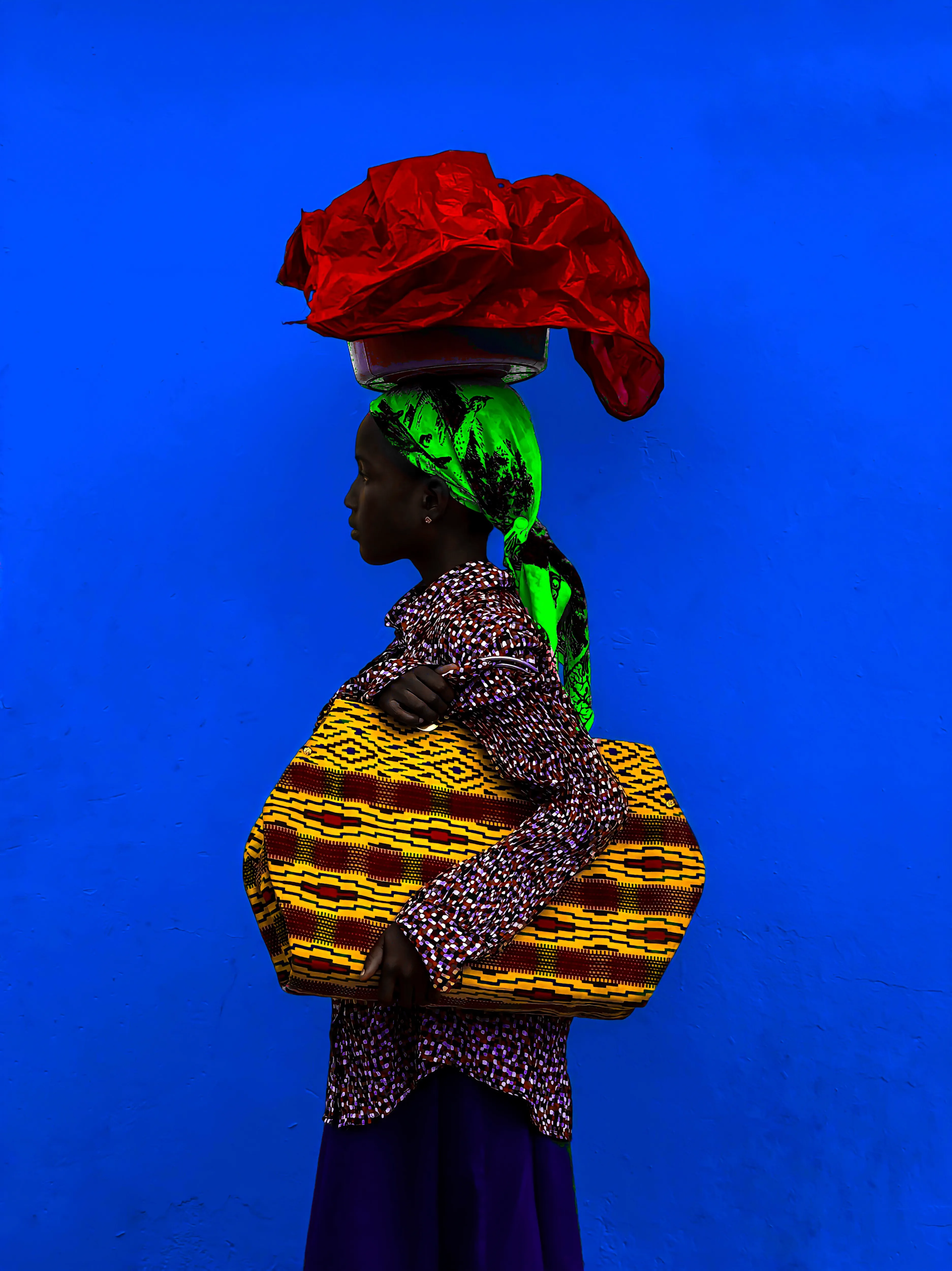 The African Girl Child by Sarfo Emmanuel Annor

The Essence of Color is a collection of 35 vibrant and colorful portraits celebrating the heritage and customs of Ghana. In this collection, Sarfo Emmanuel Annor explores the contrast between the black skin and joyful colors to shed light on African fashion, beauty and culture. 

Edition: 1/1