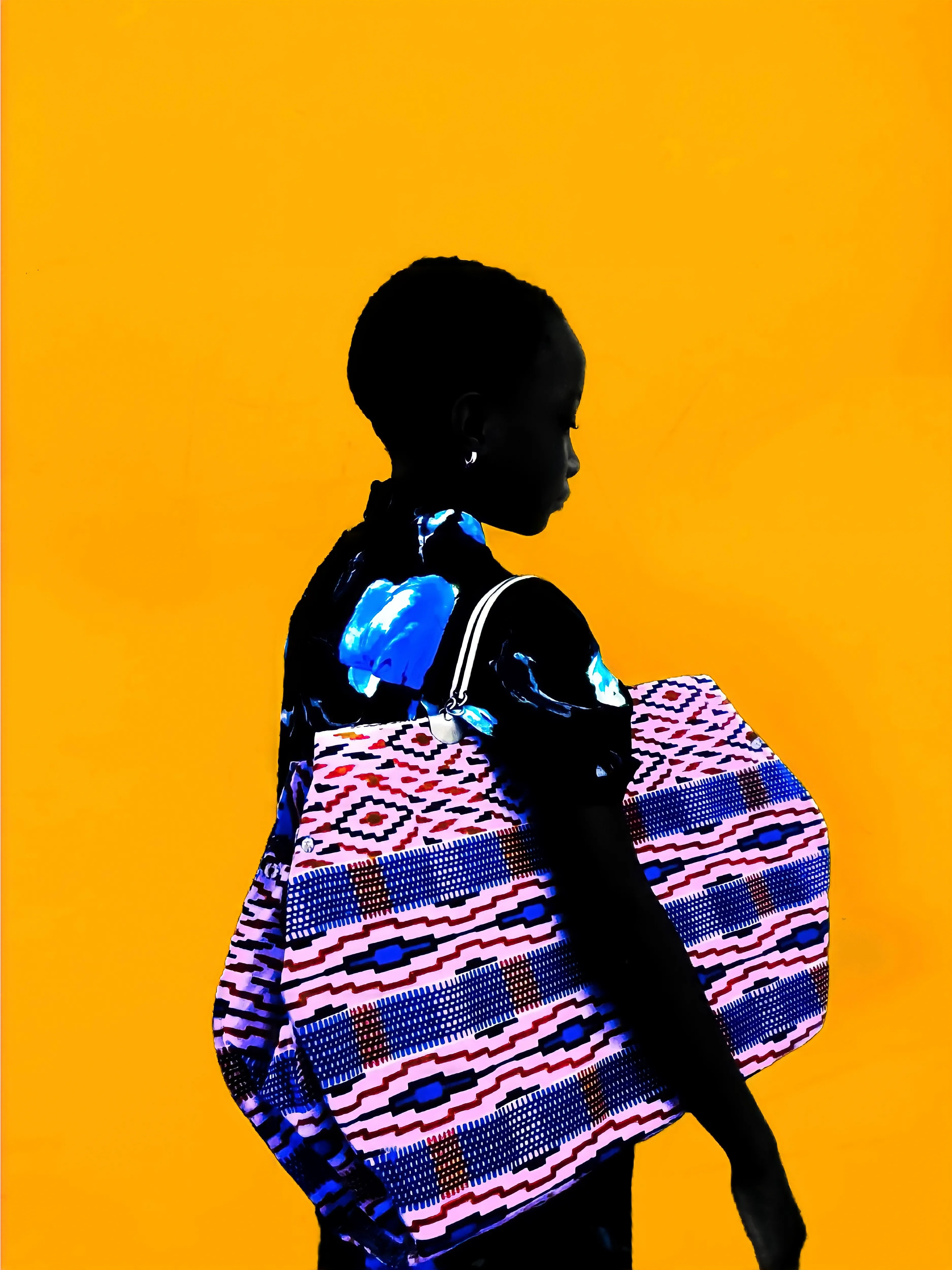 Finding Calm by Sarfo Emmanuel Annor 

The Essence of Color is a collection of 35 vibrant and colorful portraits celebrating the heritage and customs of Ghana. In this collection, Sarfo Emmanuel Annor explores the contrast between the black skin and joyful colors to shed light on African fashion, beauty and culture. 

Edition: 1/1