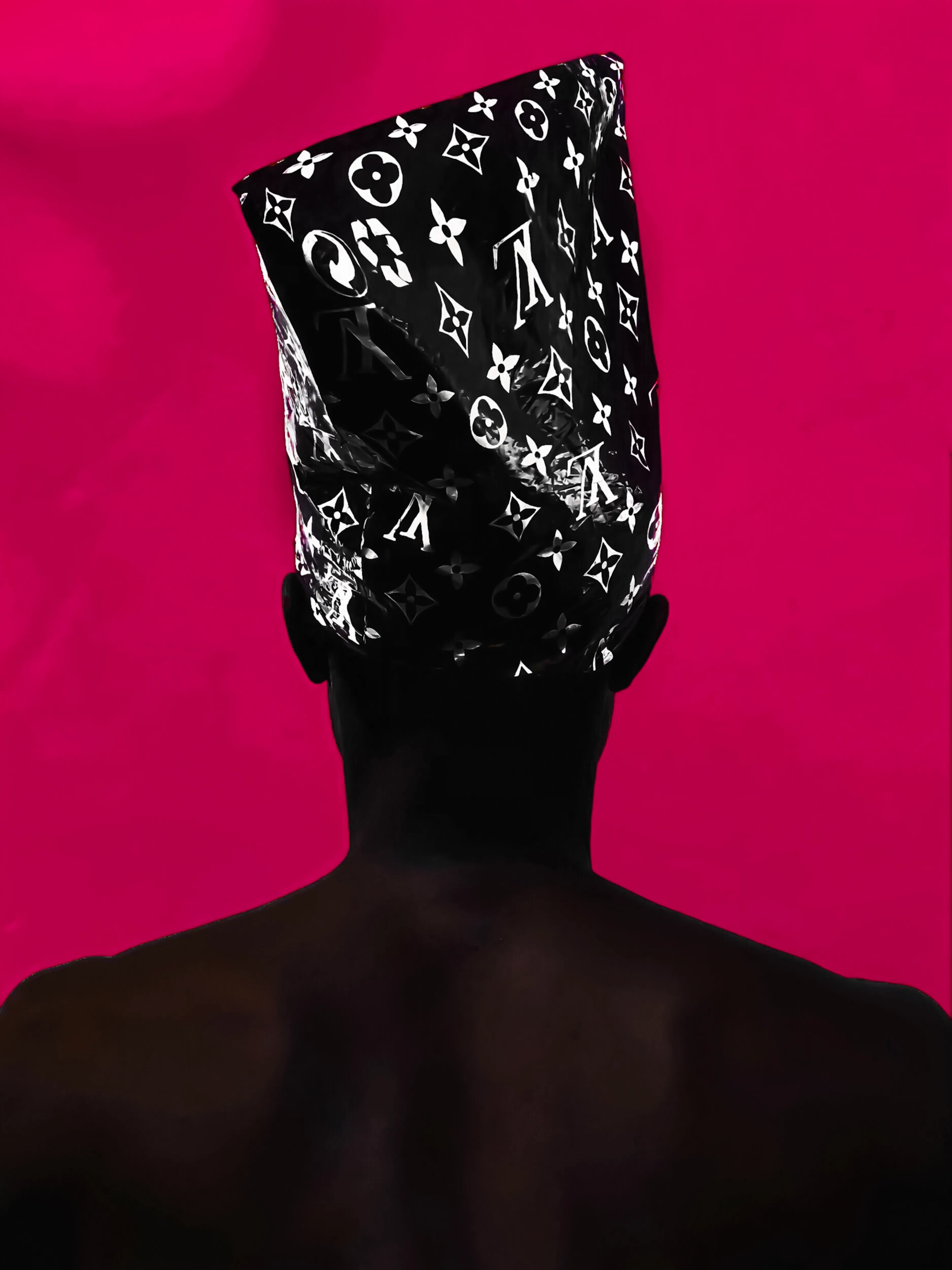 The LV Hat by Sarfo Emmanuel Annor

The Essence of Color is a collection of 35 vibrant and colorful portraits celebrating the heritage and customs of Ghana. In this collection, Sarfo Emmanuel Annor explores the contrast between the black skin and joyful colors to shed light on African fashion, beauty and culture.