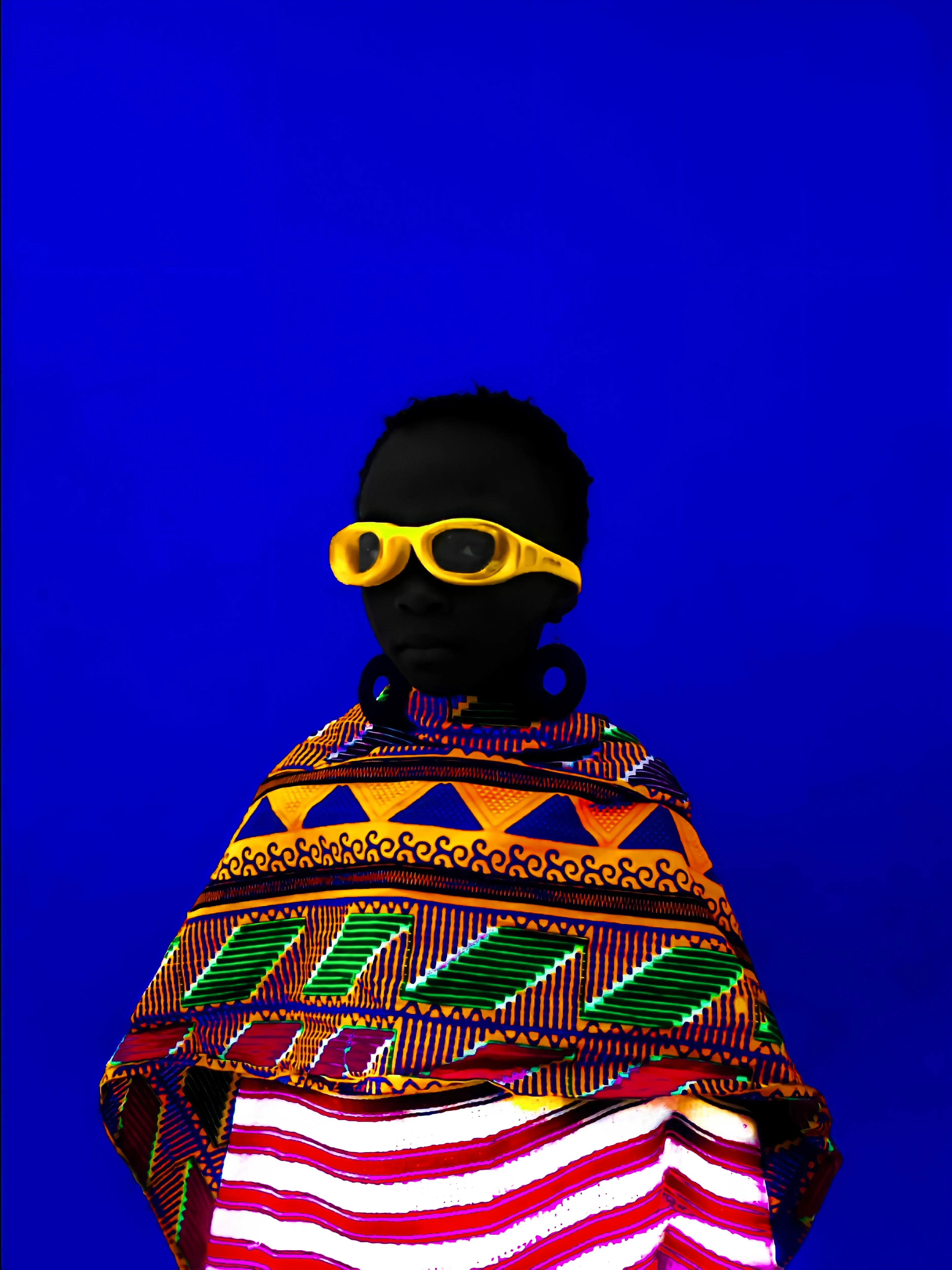 Looking To The Future by Sarfo Emmanuel Annor

The Essence of Color is a collection of 35 vibrant and colorful portraits celebrating the heritage and customs of Ghana. In this collection, Sarfo Emmanuel Annor explores the contrast between the black skin and joyful colors to shed light on African fashion, beauty and culture. 

Edition: 1/1
