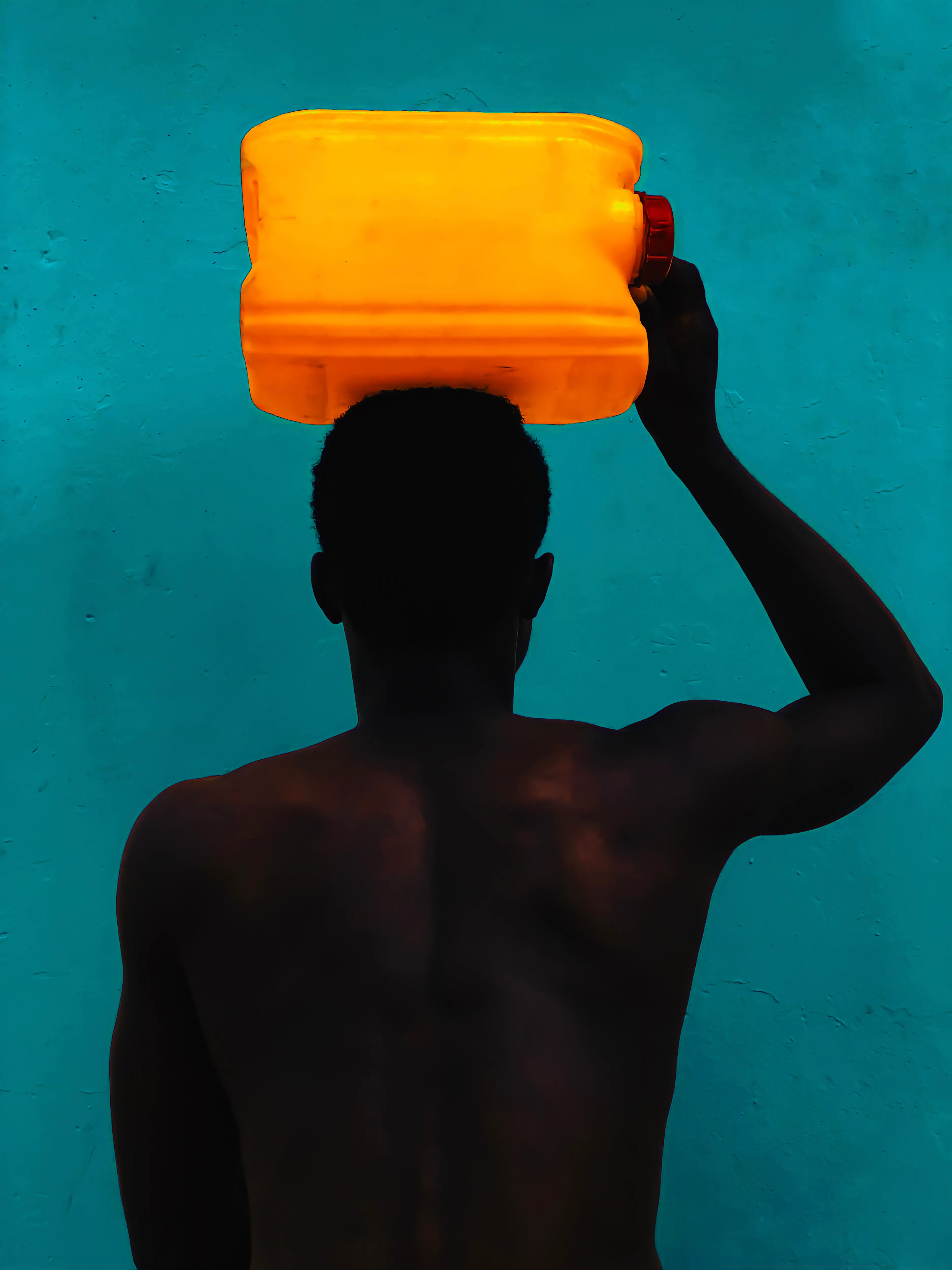 Gallon Thoughts by Sarfo Emmanuel Annor 

The Essence of Color is a collection of 35 vibrant and colorful portraits celebrating the heritage and customs of Ghana. In this collection, Sarfo Emmanuel Annor explores the contrast between the black skin and joyful colors to shed light on African fashion, beauty and culture. 

Edition: 1/1