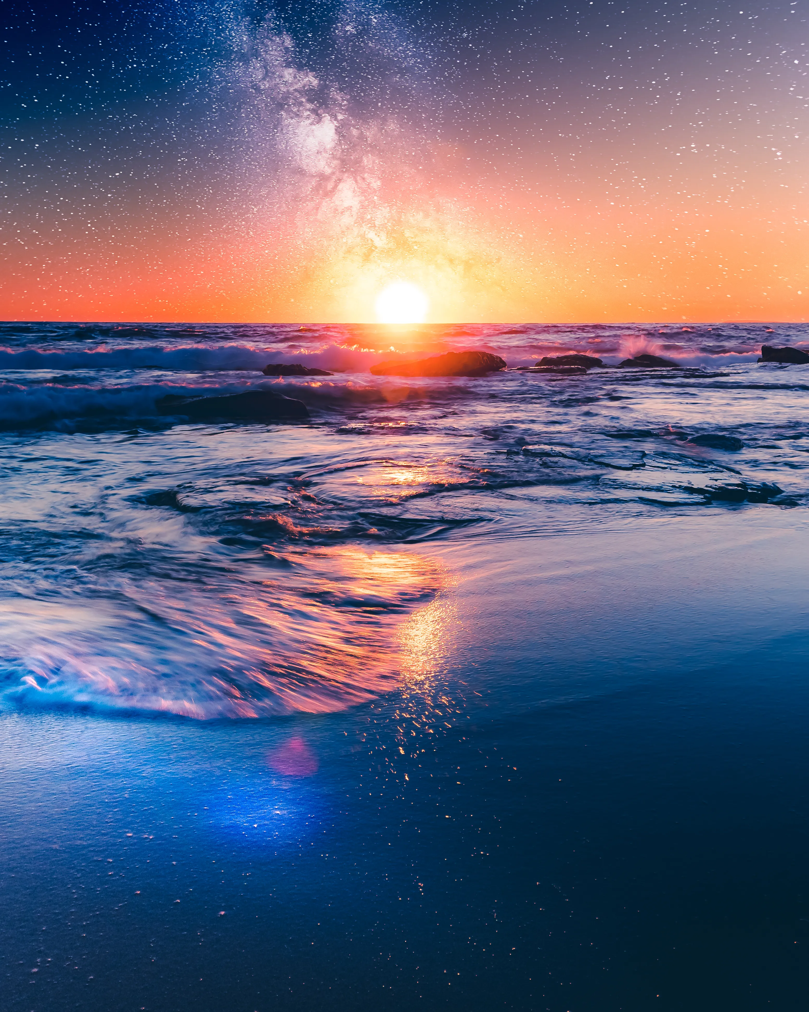 Waking up before dawn to capture sunrise is one thing but staying up all night to capture the milky way over the horizon is what makes photography so challenging and equally enjoyable sometimes.

This is a composite of three shots taken at the same location in Sydney, Australia. Getting up at 4am to shoot the blue hour long exposure and the subsequent sunrise. I knew the flow of the water and light refracting off the reflections on the sand needed something more. So I created the idea of astro and sunrise together to create some magic.

I will be adding more pieces like this in future as I find coastal compositions that work for the concept.

License: No rights provided for commercial use - merchandise - distribution - or derivative works. Copyright remains with the NFT creator.