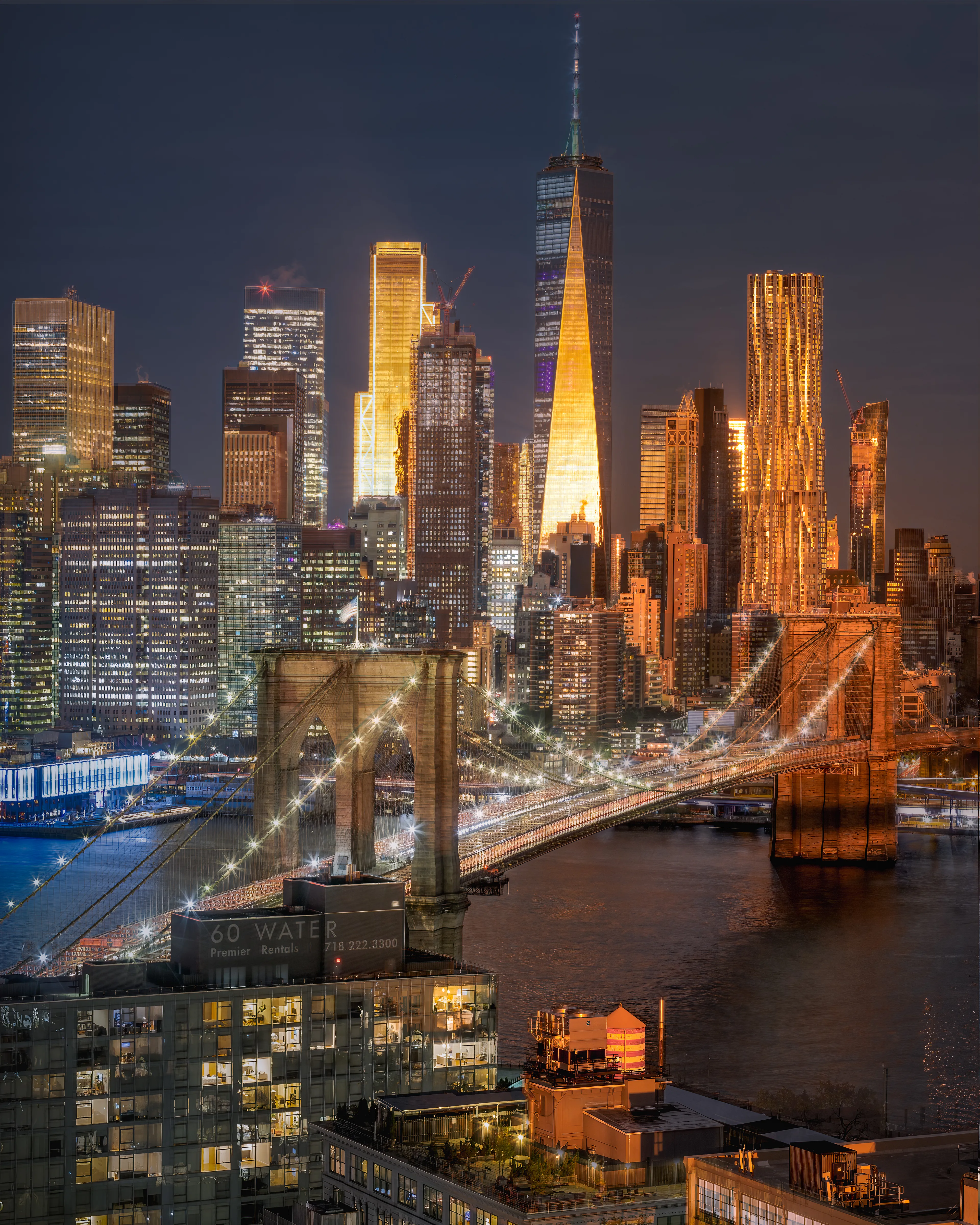 Slices of TIme is a blend of two images shot 4 months apart.  Sunrise combined with Night are what comprises this image.  I felt that "Slices of Time" was appropriate because so often in NYC modern architecture lives alongside the historic landmarks.  NYC is both historic and on the bleeding edge of architectural innovation.

When I make a blended image, my goal is to make the blend so gentle that the eye accepts it before the mind catches on.  I am pleased to offer up one of my favorite blended images todate.