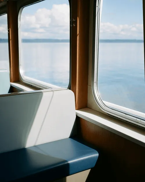 One of my favorite things about traveling on the ferries is the calm. When life gets hectic, and the noise starts to get too loud, I head out and take the ferry somewhere. I love finding shadows on the empty booths, shooting candid shots of people, and soaking in the beauty of the mountains that surround the Seattle area.