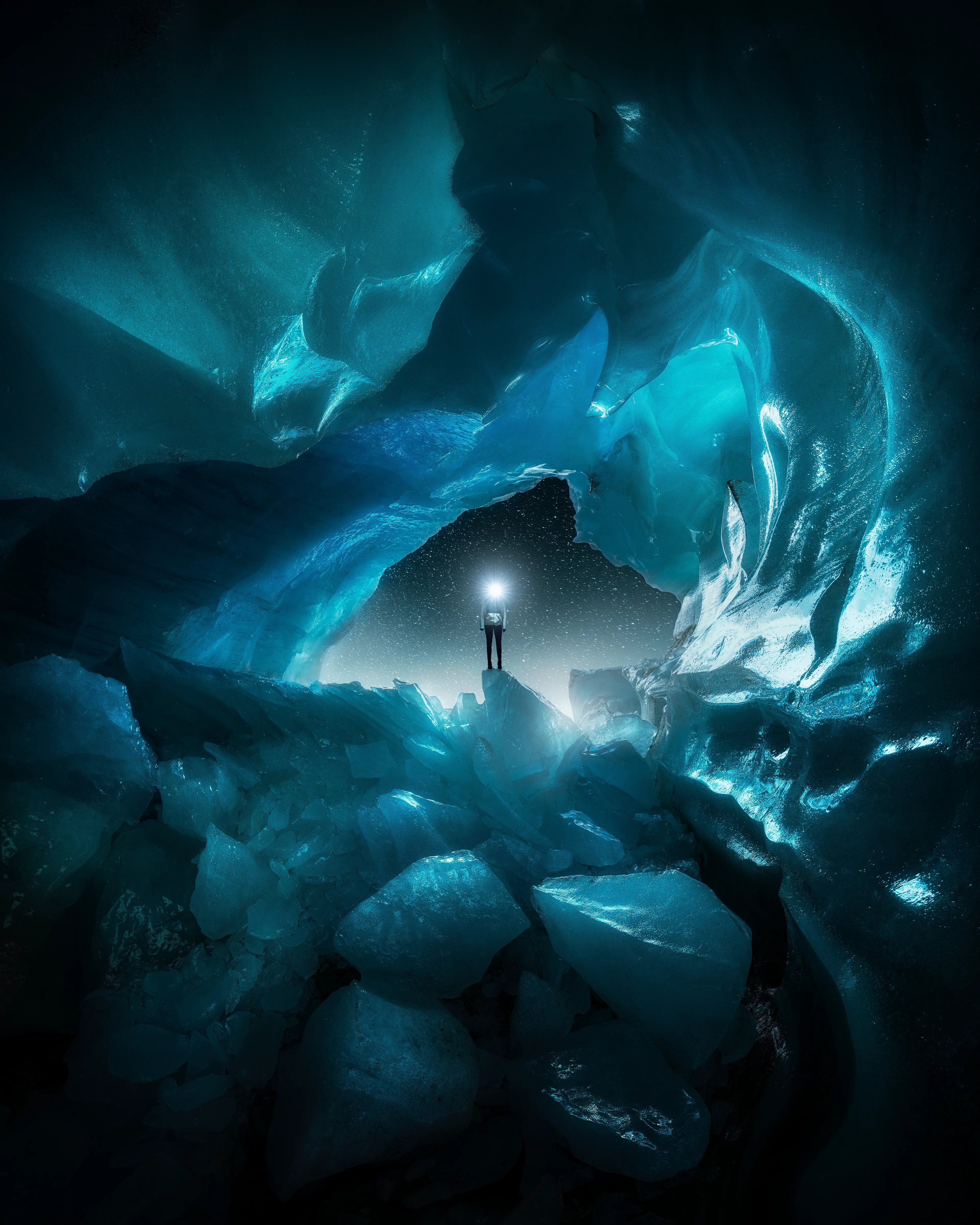 Memories of a dangerous solo glacier exploration deep into the wilderness of British Columbia. A place where I risked my life taking this image, leaving my mind to wander through existential questions about life, death, and the afterlife. // A bright light. Transcendence of Ego and spatiotemporal boundaries. Altered time perception, entering an unearthly environment. Mind and body co-existing in duality but separated. Moving through a tunnel filled with blue velvet darkness. Uncontrollable attraction to a brilliant light, a feeling of becoming one with it. Is it myself? A lifting mind, an overwhelming sense of peace and well-being. Floating in silence, fearless. Pain existing more in imagination than reality. This light again. An endless end. 