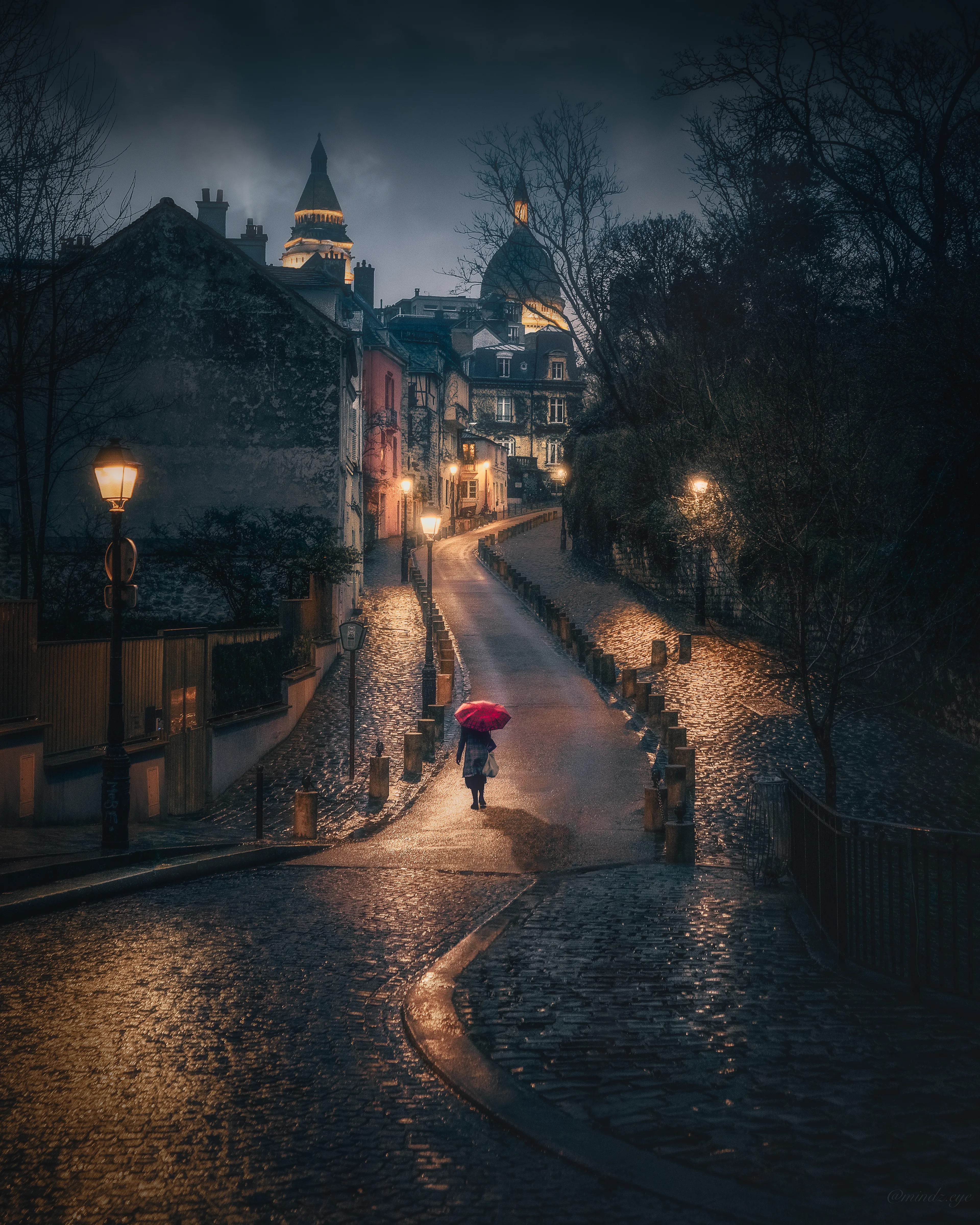 Over the course of my photography career, I’ve spent many nights wandering the streets alone with my camera. Occasionally, a stranger and I will cross paths and unbeknownst to them, we will create art together. This is one of those moments from the streets of Montmartre in Paris.




