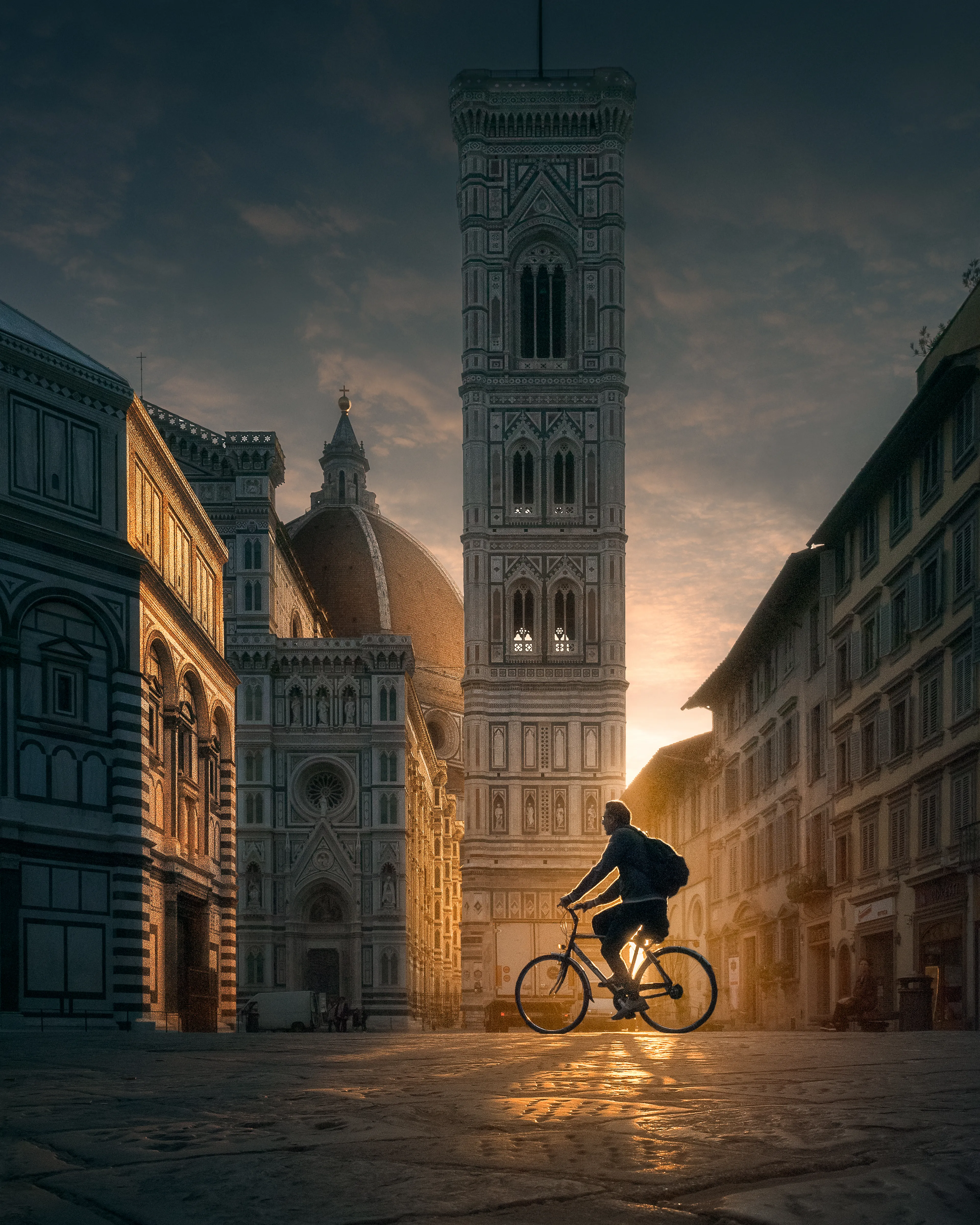 Made my way to an empty plaza at the Piazza del Duomo in Florence before sunrise. Wasn’t quite sure what I would get but I waited patiently as the sun rose above the horizon, its glow piercing through the alleyways and drenching the streets of this beautiful, medieval city. And then I saw him, a Florentine stranger on his bike, likely making his way to work. For an instant, under the shadow of the Duomo, I was able to freeze his fleeting silhouette against the rising light.