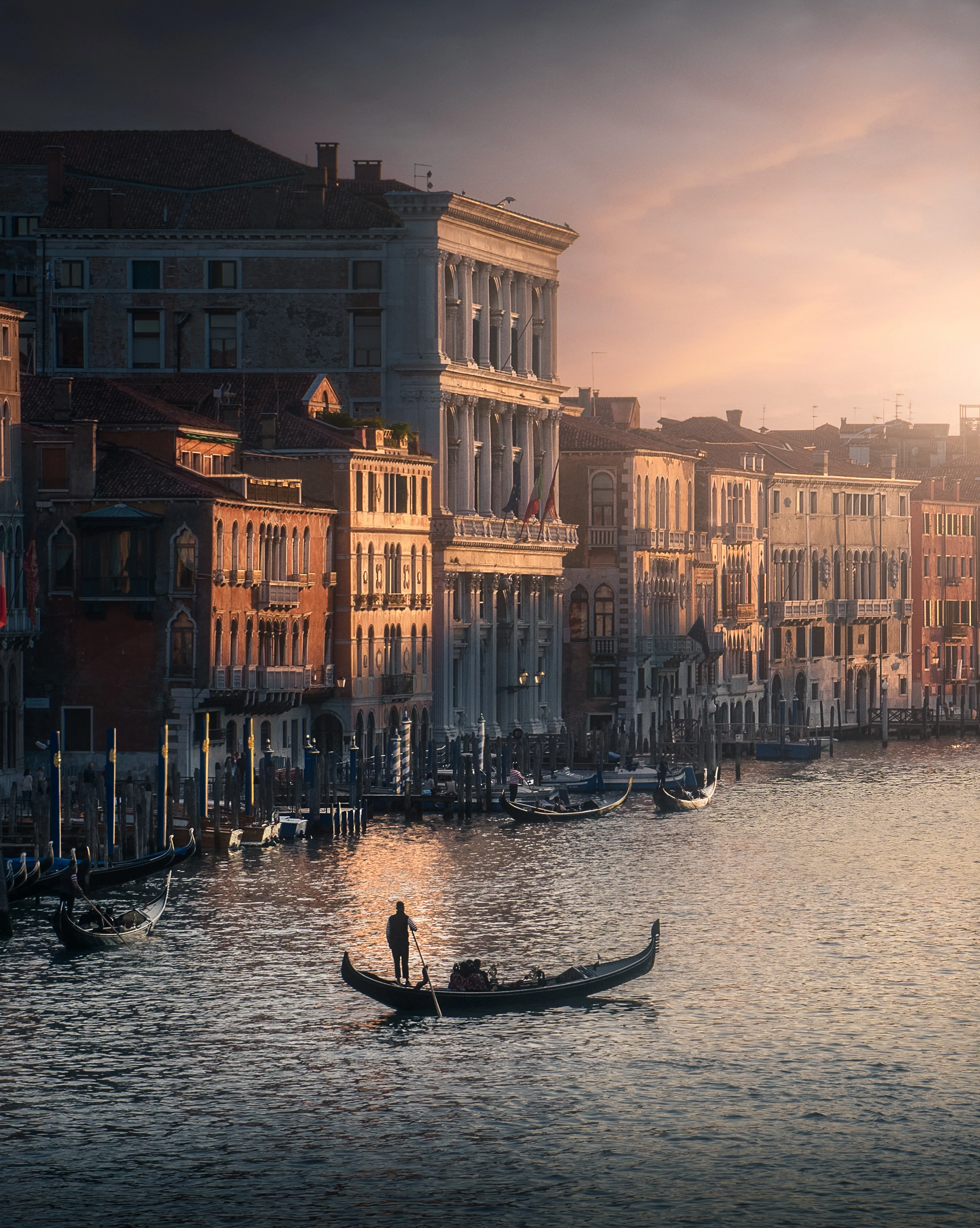As the sun sets along the Canal, a lone gondolier basks in its last light. For him, this is the end of a long day’s work. Through my eyes, he’s part of a grander scene - one that quintessentially showcases an historical city suspended in time.