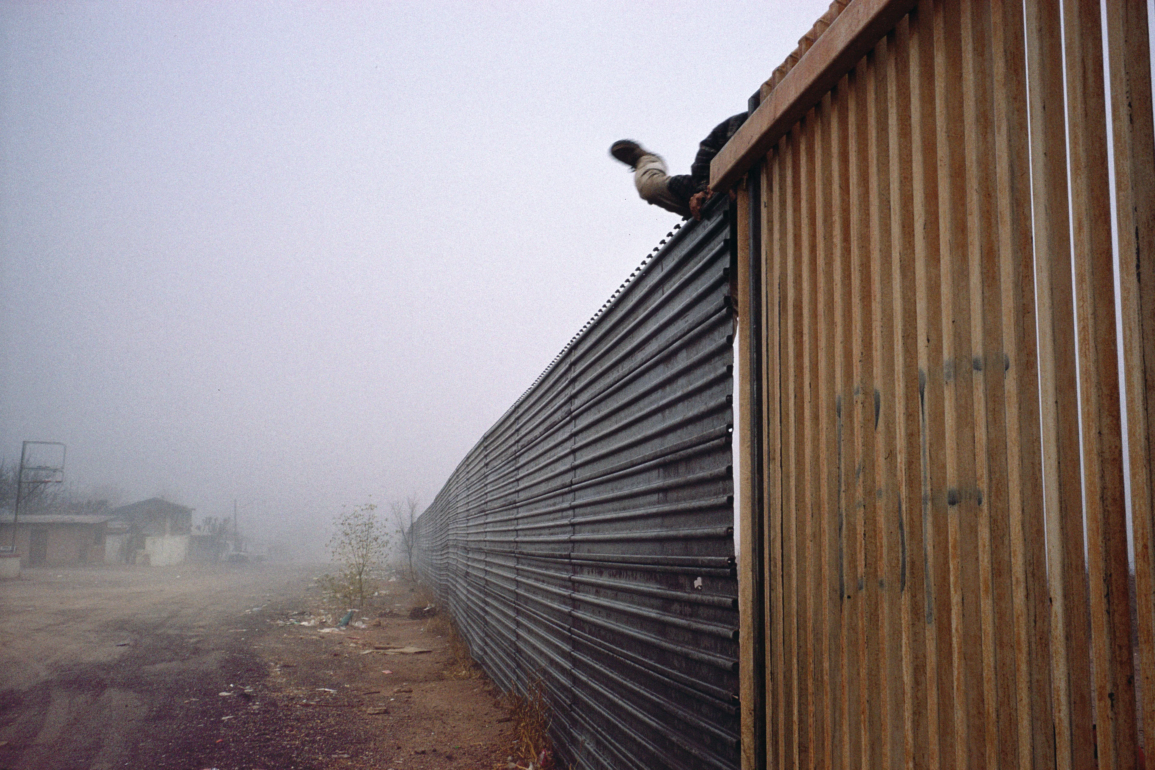 From his first visit in 1975, he was immediately captivated by the vibrant life in the streets of Mexico. While his early black and white photos often feature stark, striking graphics, his foray into color photography starting in 1978—inspired by the light and color of the Mexican streets—marks a turning point in his work.

Throughout his work from Mexico, his rich compositions create compelling visual complexity—‘La Calle’ features strong, saturated colors, which evoke haunting, enigmatic scenes of the everyday. “I work extremely intuitively. I wander, I respond,” he says. “Am I aware of certain elements rationally at times? Sure. But I think that often when I am more aware of them, it usually means that the picture falls flat.”

Webb somehow manages to capture these surprising scenes, which add an otherworldly poetry to the genre of street photography.