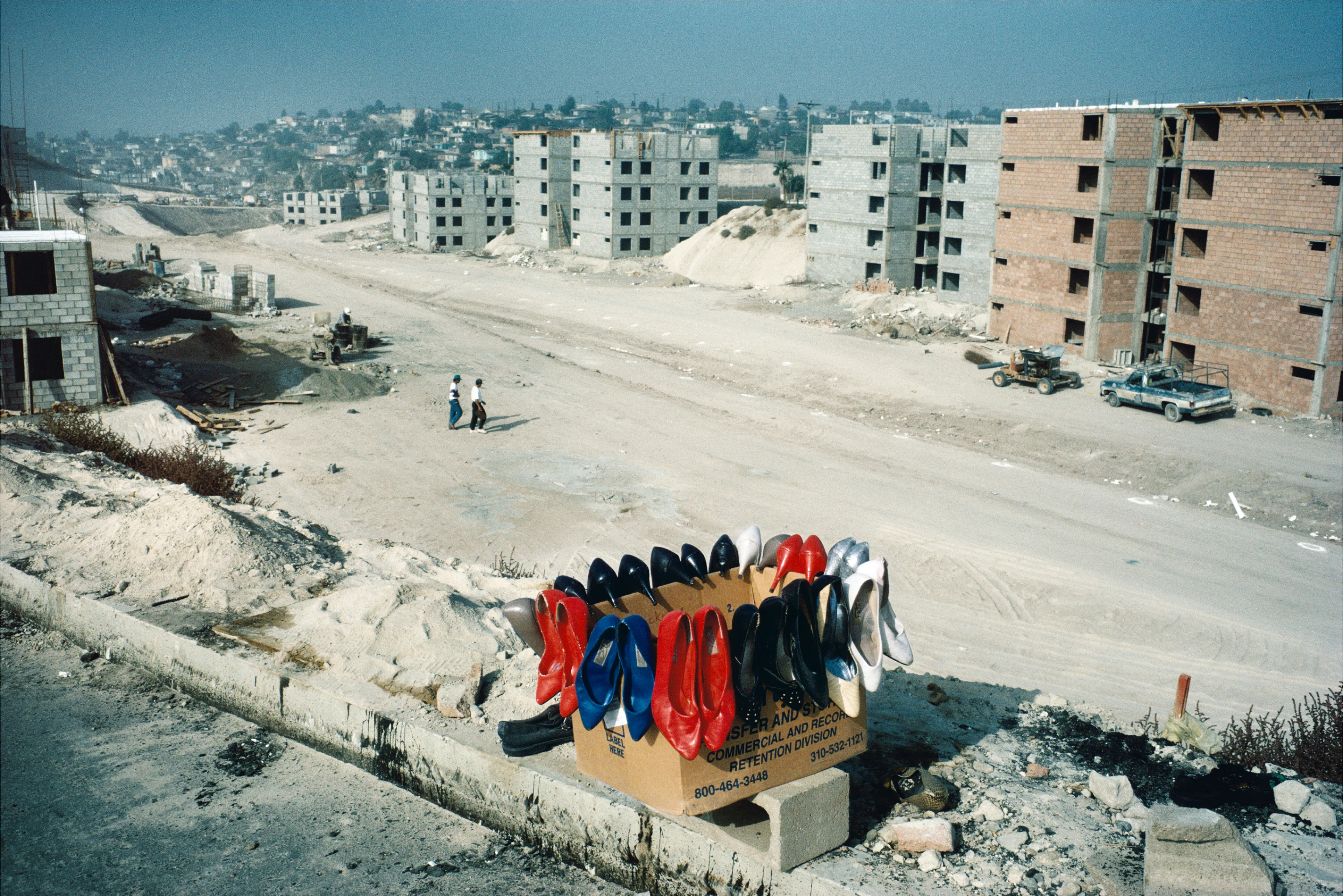From his first visit in 1975, he was immediately captivated by the vibrant life in the streets of Mexico. While his early black and white photos often feature stark, striking graphics, his foray into color photography starting in 1978—inspired by the light and color of the Mexican streets—marks a turning point in his work.

Throughout his work from Mexico, his rich compositions create compelling visual complexity—‘La Calle’ features strong, saturated colors, which evoke haunting, enigmatic scenes of the everyday. “I work extremely intuitively. I wander, I respond,” he says. “Am I aware of certain elements rationally at times? Sure. But I think that often when I am more aware of them, it usually means that the picture falls flat.”

Webb somehow manages to capture these surprising scenes, which add an otherworldly poetry to the genre of street photography.