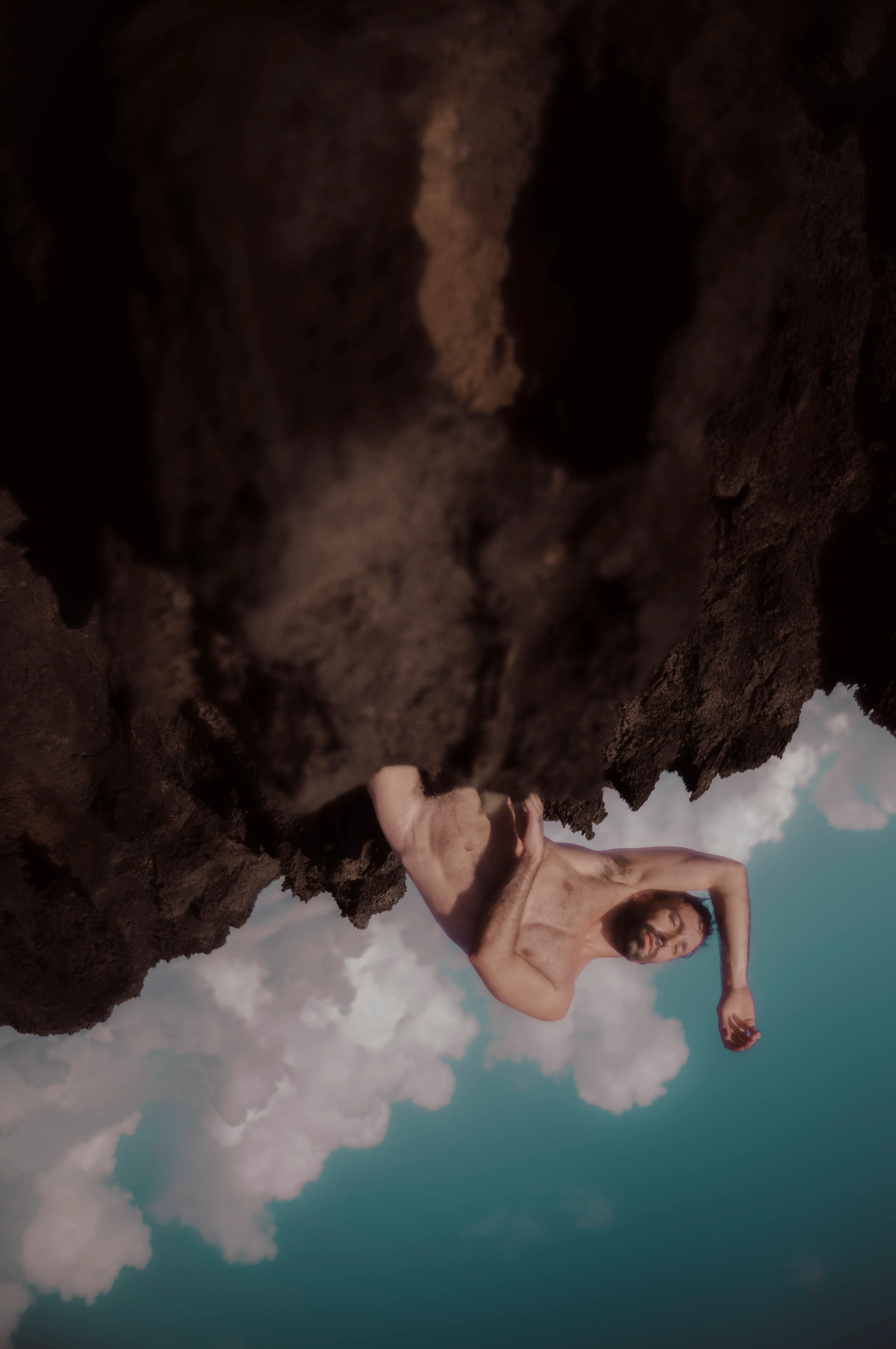 At the edge.

I let myself fall into the sky.

Pulled between my strengths and my fragility. 

The heavens beneath me carry the weight of my doubt as the world turns upside down. 

I am bare,

 exposed—  
drifting through the quiet storm inside.

Soon, it will be alright.