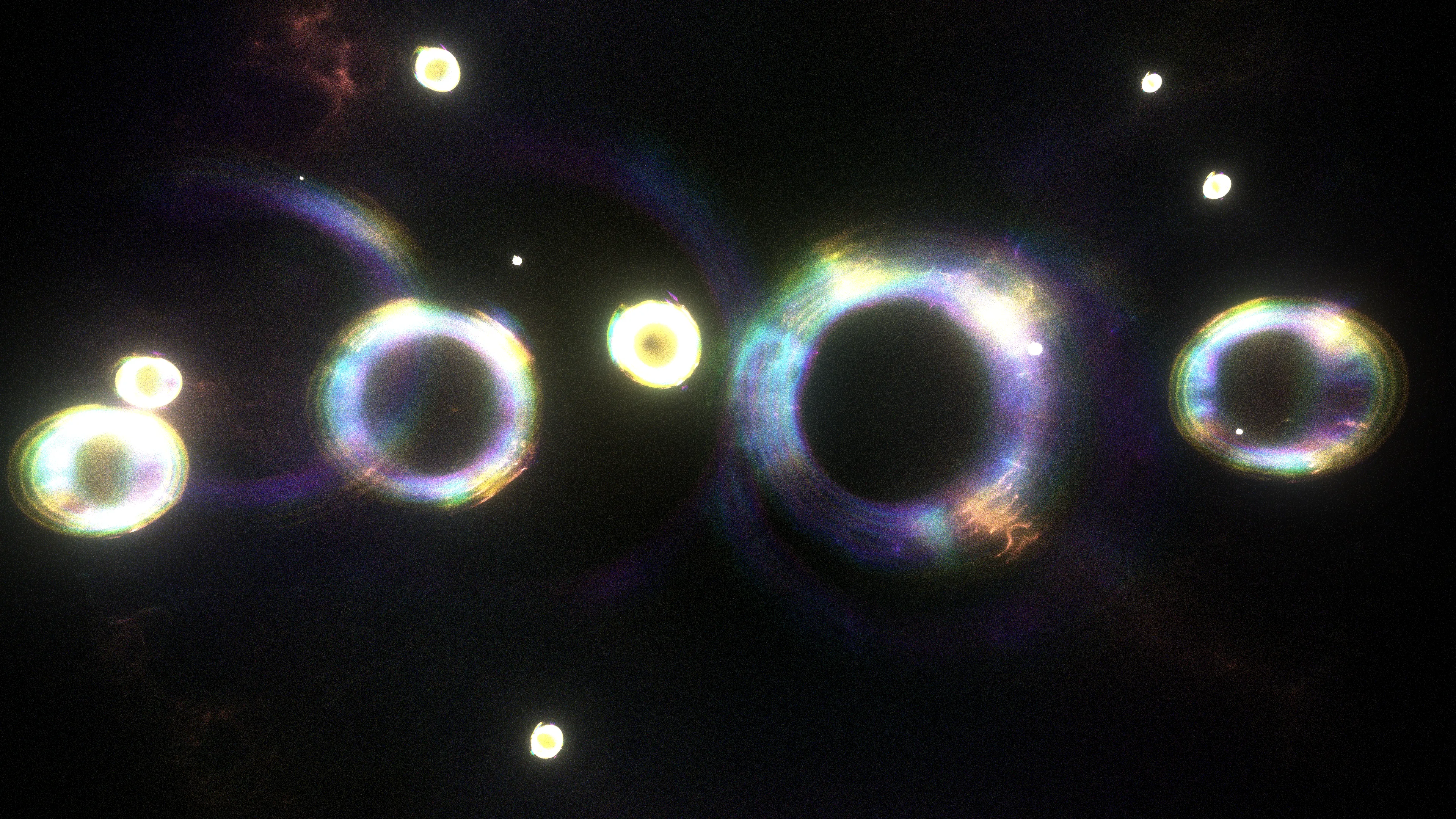 <p>At the moment of the primordial event (scientists call it the “Big Bang”), the universe had a high degree of symmetry, meaning its properties were consistent in all directions. As the universe evolved, some of those symmetries broke down, leading to the formation of matter and the diversity we observe today. Recent studies of this symmetry, and ways of breaking it, have helped modern physics uncover the origins of mass, the behavior of particles, and the structure of the universe itself, providing profound insights into the fundamental nature of reality.</p>
<p>In “A broken symmetry — the cat’s parabola,” HAL09999 experiments with slight variations on the initial conditions of a system made from millions of particles. By using simple physics in what the artist calls a “quasi-simulation,” these pixels are scattered through the space of the screen without any intention of a specific outcome. Any shapes observed in the final images are the consequence of the primordial asymmetry applied to the original system.</p>
<p>Without reference to scale, these works can represent the fundamental forms of phenomena that are typically invisible to the eye. Whether they are the shapes of cosmic birth and its expansion, splattered particles that make up the material world, or even intangible memories, these works share the harmony within the asymmetrical nature of our existence.</p>
