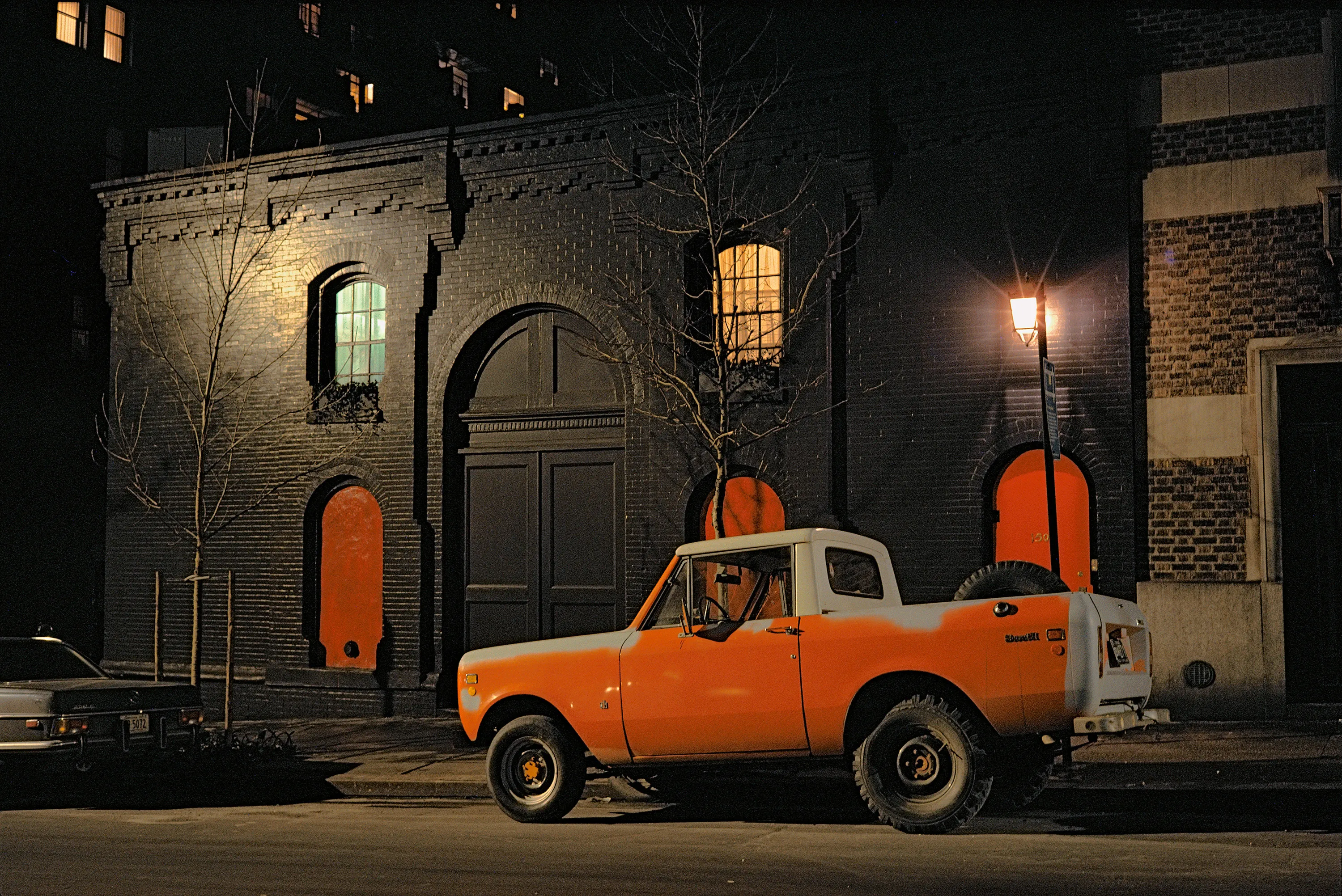 Big Wheel Car, Ford Scout II, Murray Hill, 1974

Assembly and Jackson Fine Art present "Cars: New York City, 1974-1976” by Mississippi-­based visual artist Langdon Clay. This NFT collection explores an imprint of the former streets of New York City and New Jersey. When Clay came to the realization that the bold colors of the world around him did not match the black & white film he was shooting, he shifted to color. Clay developed “Cars” with a big tripod, a Leica, a 40mm lens, Kodachrome film and two years of roaming. The night developed its inherent color, with one car, and one background. Moved by painters such as Edward Hopper, Clay keeps these images, much like their subjects, classic. “Cars” showcases now vintage cars simplistically lit and shot straightforward, while still encapsulating the New York City and New Jersey streets as its backgrounds. Yet, against their directness there is much detail for the eyes to wander over and take in, just as Langdon Clay once did on the very streets he captured.

Langdon Clay is a photographer based in Sumner, Mississippi. His work is a testament to classic Americana and has been broadly exhibited at venues including Museum of Modern Art, New York; Polka Galerie, Paris, France; and Museum of Contemporary Art, Atlanta.