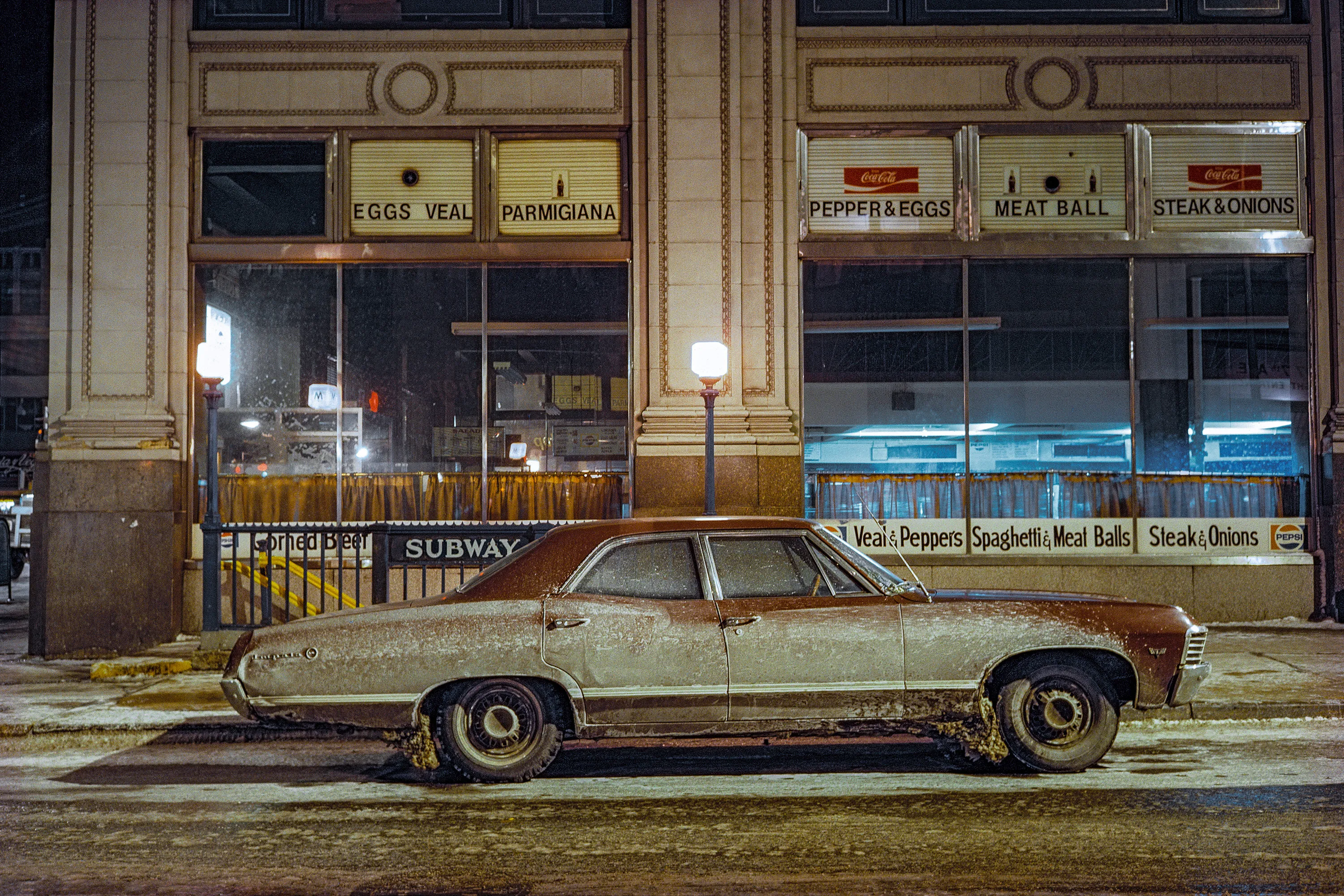 Subway Impala, Chevrolet Impala, 7th Avenue and 29th Street, 1974

Assembly and Jackson Fine Art present "Cars: New York City, 1974-1976” by Mississippi-­based visual artist Langdon Clay. This NFT collection explores an imprint of the former streets of New York City and New Jersey. When Clay came to the realization that the bold colors of the world around him did not match the black & white film he was shooting, he shifted to color. Clay developed “Cars” with a big tripod, a Leica, a 40mm lens, Kodachrome film and two years of roaming. The night developed its inherent color, with one car, and one background. Moved by painters such as Edward Hopper, Clay keeps these images, much like their subjects, classic. “Cars” showcases now vintage cars simplistically lit and shot straightforward, while still encapsulating the New York City and New Jersey streets as its backgrounds. Yet, against their directness there is much detail for the eyes to wander over and take in, just as Langdon Clay once did on the very streets he captured.

Langdon Clay is a photographer based in Sumner, Mississippi. His work is a testament to classic Americana and has been broadly exhibited at venues including Museum of Modern Art, New York; Polka Galerie, Paris, France; and Museum of Contemporary Art, Atlanta.