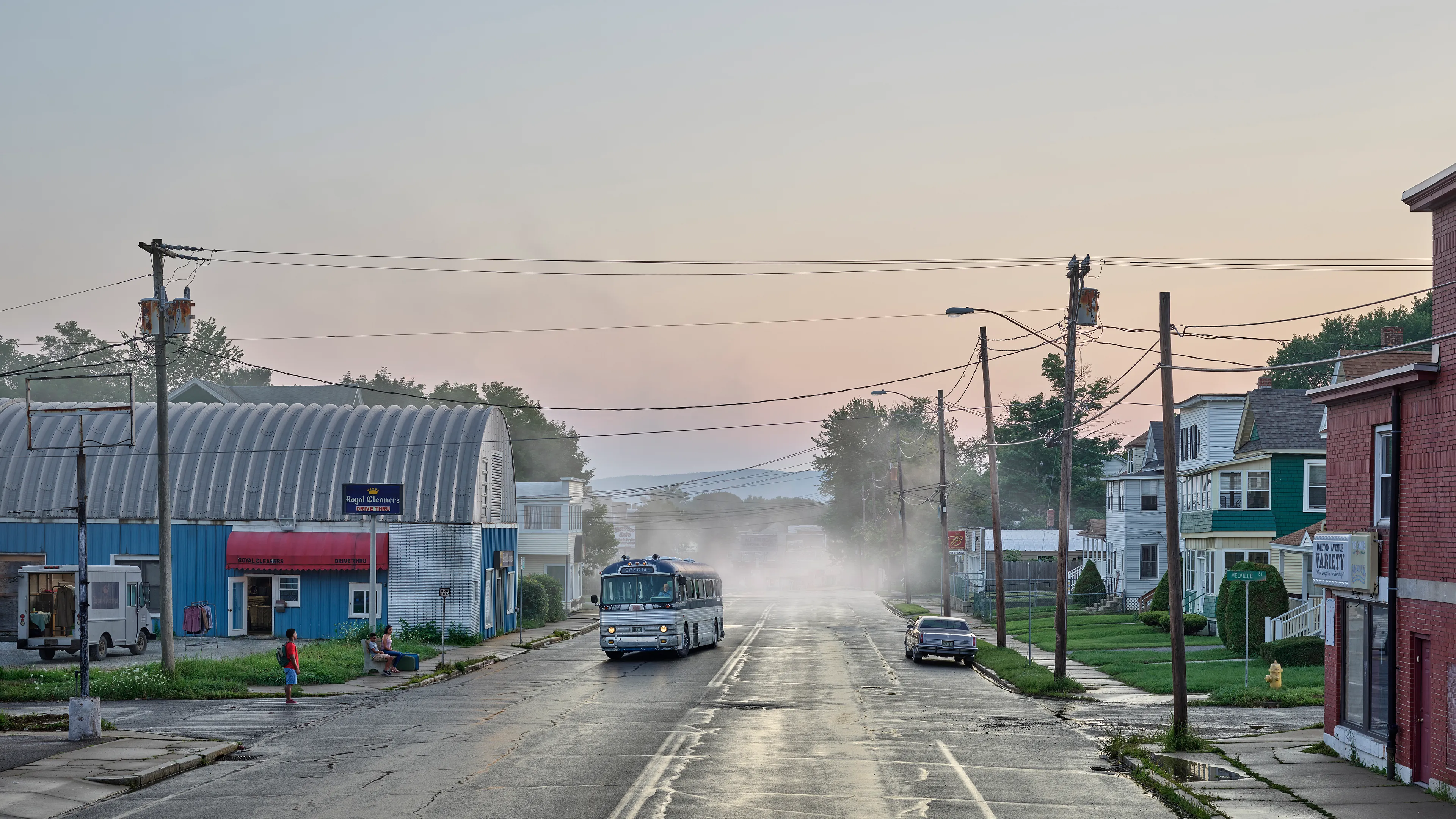 Within the frames of Crewdson’s body of work, An Eclipse of Moths (2018-19), we encounter the artist’s fascination with the idea of a haunted American landscape. Set in post-industrial small-town America, An Eclipse of Moths tours viewers through the quiet wreckage of rusted and downtrodden working-class environments. More than his previous work, feelings of emptiness pervade these pictures as the visual space depicts broad expanses of asphalt and concrete that appear neglected and forgotten. While Crewdson often uses human gesture to convey the deep-rooted anxieties that appear throughout his oeuvre, here the landscapes themselves become the subjects while their occupants perform as part of the environment, succumbing to it, and becoming defined by it. As with all Crewdson’s work, we experience encounters with secrets that we aren’t allowed to know. The artist provides us surfaces that are charged with dark emotional energy, and it is up to us as viewers to speculate on what resides behind it all while answers remain just slightly beyond our grasp.

Edition: 1 of 1