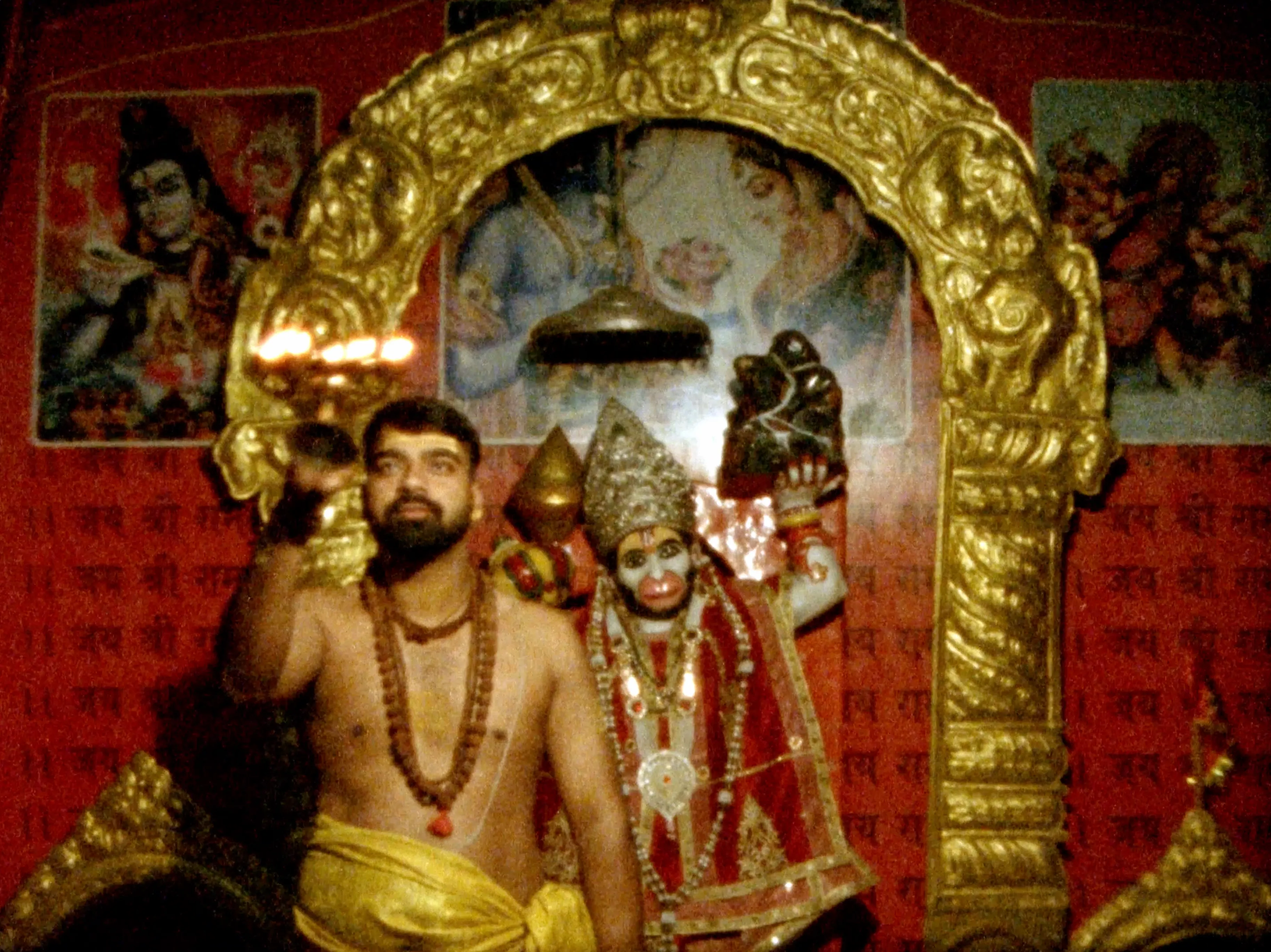 Title: 

Medium: Super-8 film

Aspect Ratio: 4:3 

Resolution: 2880 x 2160

File Type: H.264 Codec / MP4.

Comments: Ashutosh was the fire keeper of the Hanuman temple at the Ashram we were staying at. Every morning he would light the fire and pray, and every night he would ring the bell before arti and close the temple. He had a huge following on instagram and tik tok just from the songs and prayers he sings for the divine monkey god with tearing apart his chest to reveal Ram and Sita in his Heart. This deity can move mountains as gifts to other divine lords. There was a very large statue outside of the temple that embodies the story and strength of this visceral description. A giant red heart emerging from a giant monkeys body. All is love, all is one. We sat for one last prayer, a Hanuman Chalisa, before we packed our bags and rode off to Agra from the Ashram. We were supposed to fly to Goa that day but the energy did not feel right and we set off to see the marble temple of love, the great structure of the Taj Mahal. We broke loose from Rishikesh hold and tore out of town with a trusted driver and felt the tug of the city's gravitational force with a great escape velocity. It was time to continue on as much as we would have loved to stay and were welcomed to, we had more work to do!