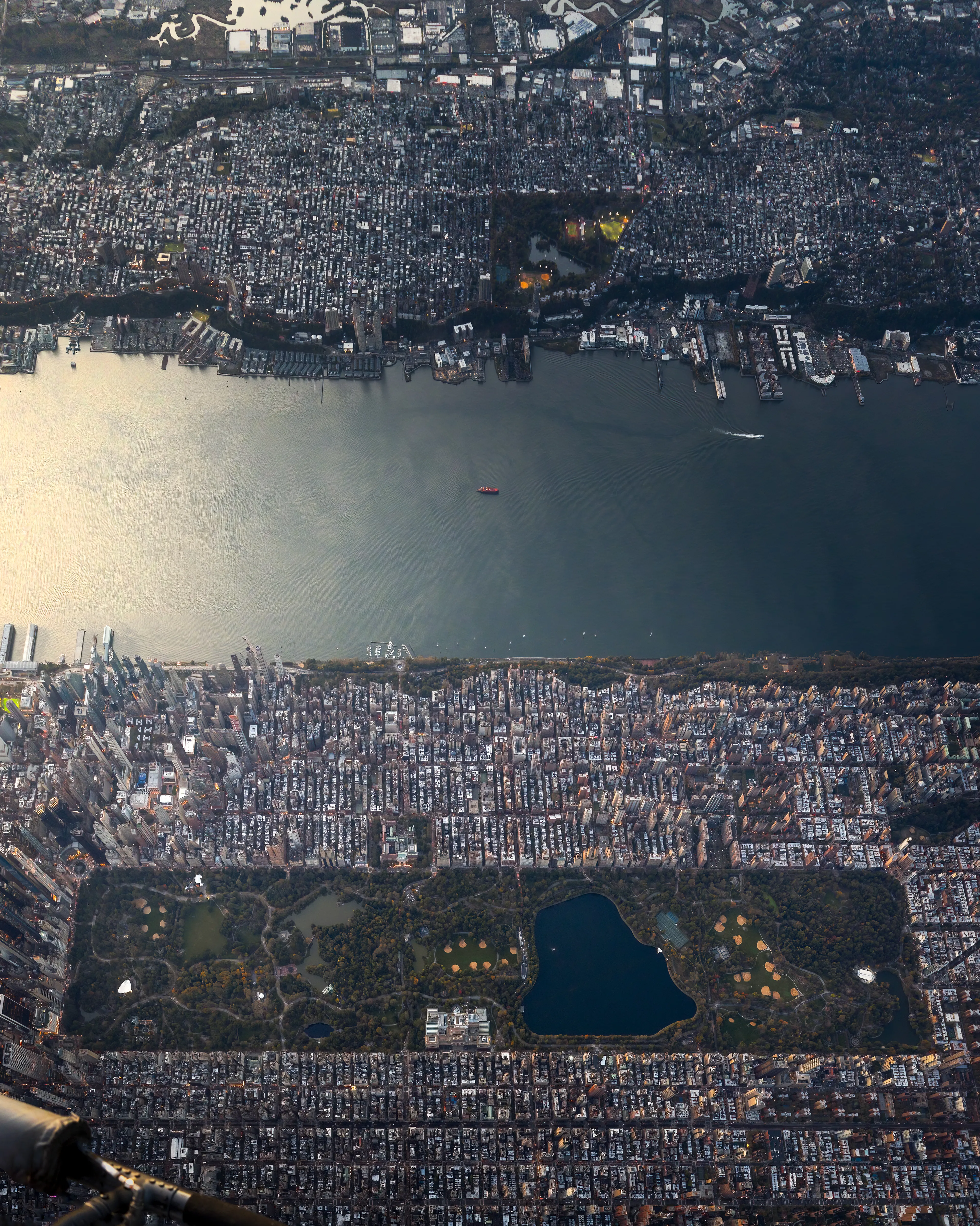 Central Park is an oasis in the desert of the grid.  Walking in Central Park, you ALMOST forget you're in New York City.  Now, take a view from 7500 feet above the island of Manhattan, and you are able to see the size of the park, which is situated in a centralized area of the island.  This image is special to me because in the frame is also the Hudson River.  This is a huge natural thoroughfare that has, through commerce, built New York into the global influence that it is today.  Once again evidence of how man has adapted the natural world to aid in its development.