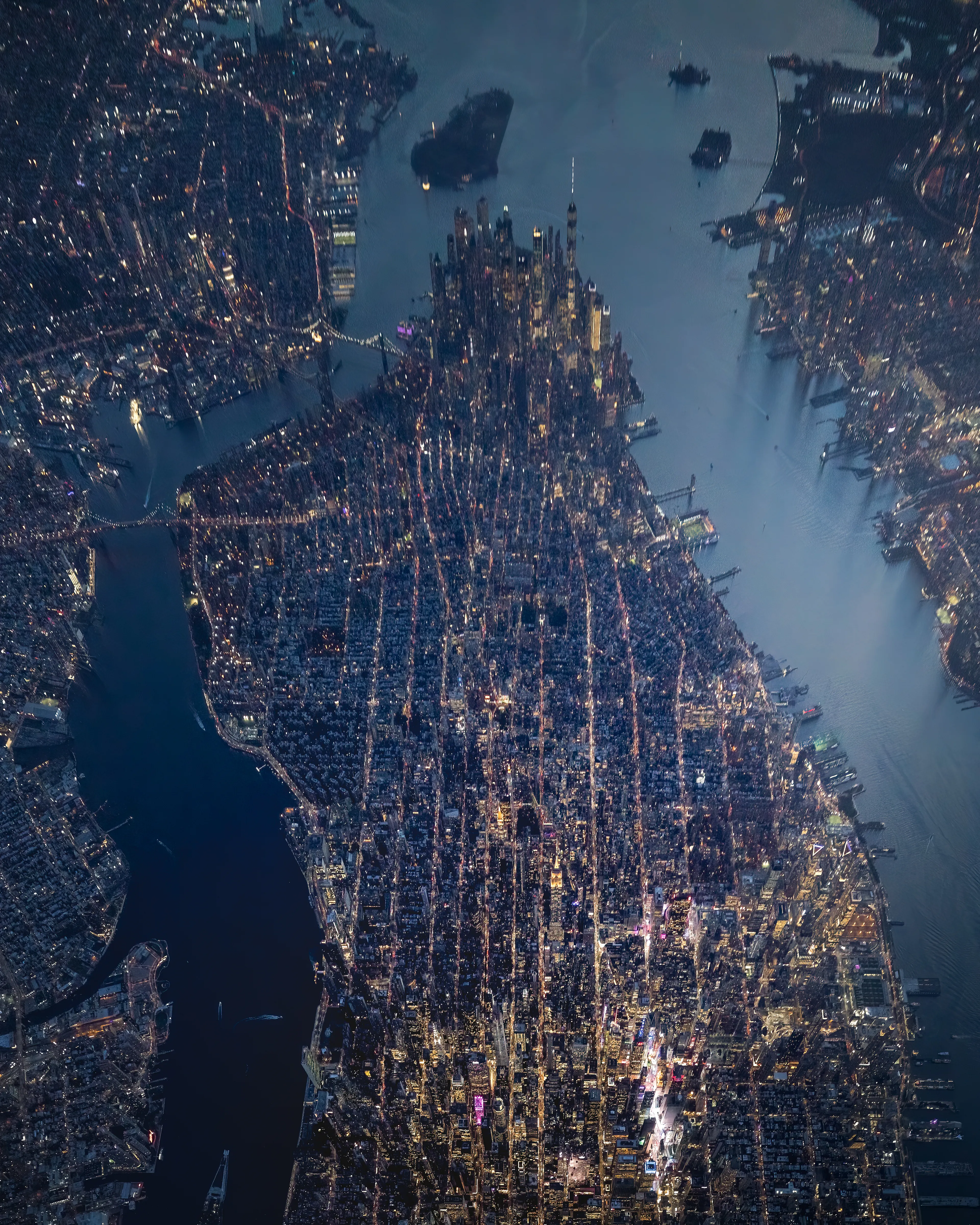 There is a magical time of day when the sun has set, and the city lights start to glow against the waning light of day. The city streets and buildings look like sparkling jewels from a mile and half above Manhattan. We oftentimes think of New York as this over stimulating assault on the senses at street level. Speed, sound, smells, people...these are all contributing elements to the complete New York experience. This doesn't ring true when you're above New York. Evening and night in New York is the one time when you can see the movements of New York. It is an incredible way to witness the sleeplessness of New York.