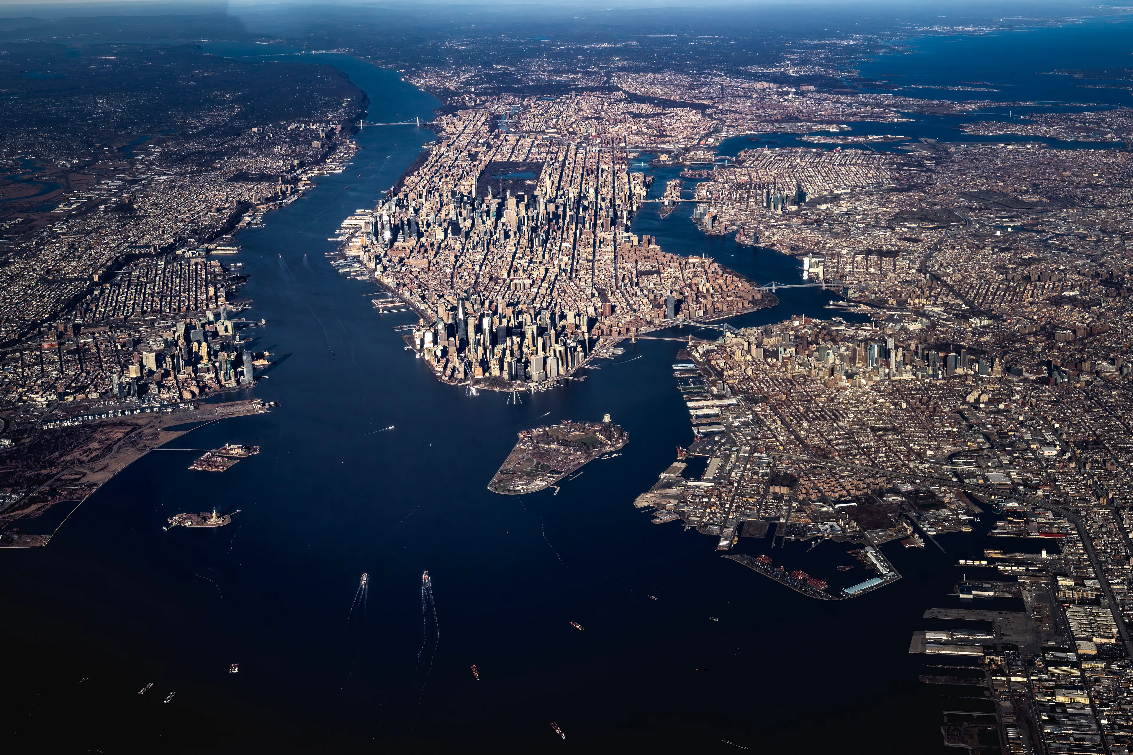 On this crisp and clear January day, my friend who is a pilot and I decided to fly higher over New York than I ever had.  At the flight's zenith, we made it just under 11,000 feet in altitude above New York Harbor.  The conditions that day were perfect for photography, and the views went on for at least 50 miles in either direction.  This may have been the most special flight I have ever taken simply for the ability to see how the rivers have carved away at the land, and formed this area.  New York is a city of rivers and islands, and no other image in my archives highlight that fact more than this.