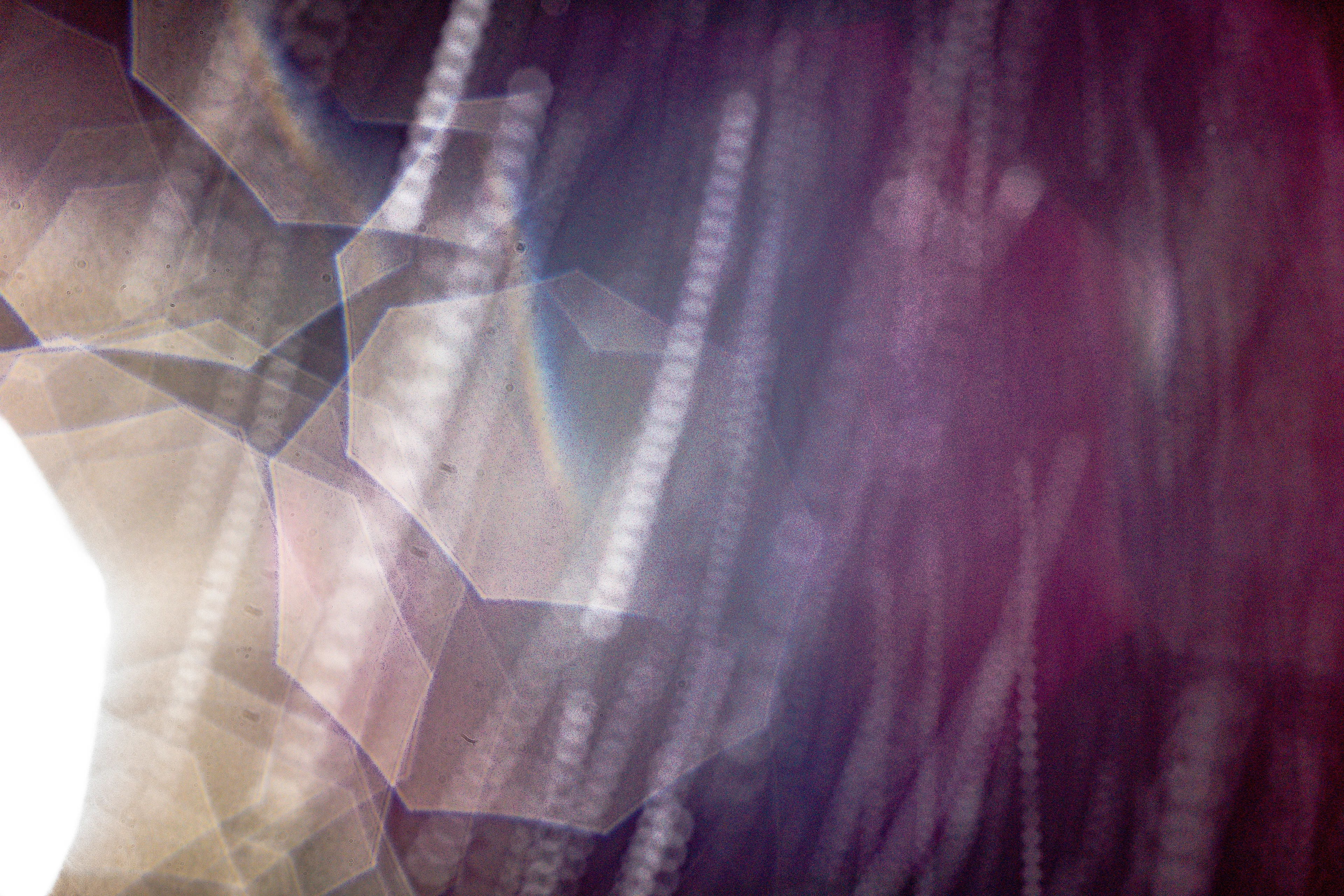 Peer into the looking glass of the SLURRIEST OF SEASONS. Photographic capture as physically generative action focuses into the light at the center of the storm. 