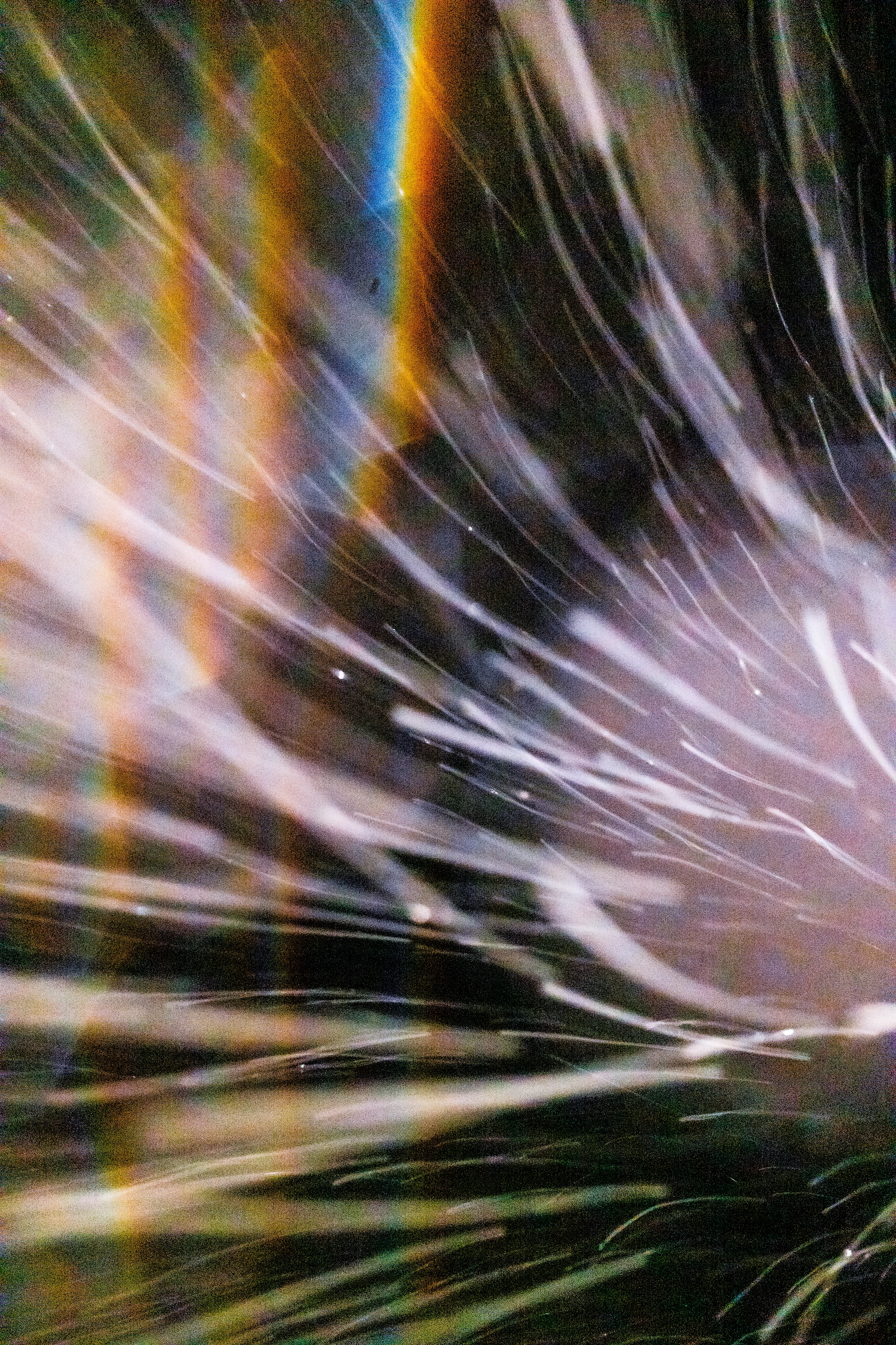 Peer into the looking glass of the SLURRIEST OF SEASONS. Photographic capture as physically generative action focuses into the light at the center of the storm. 