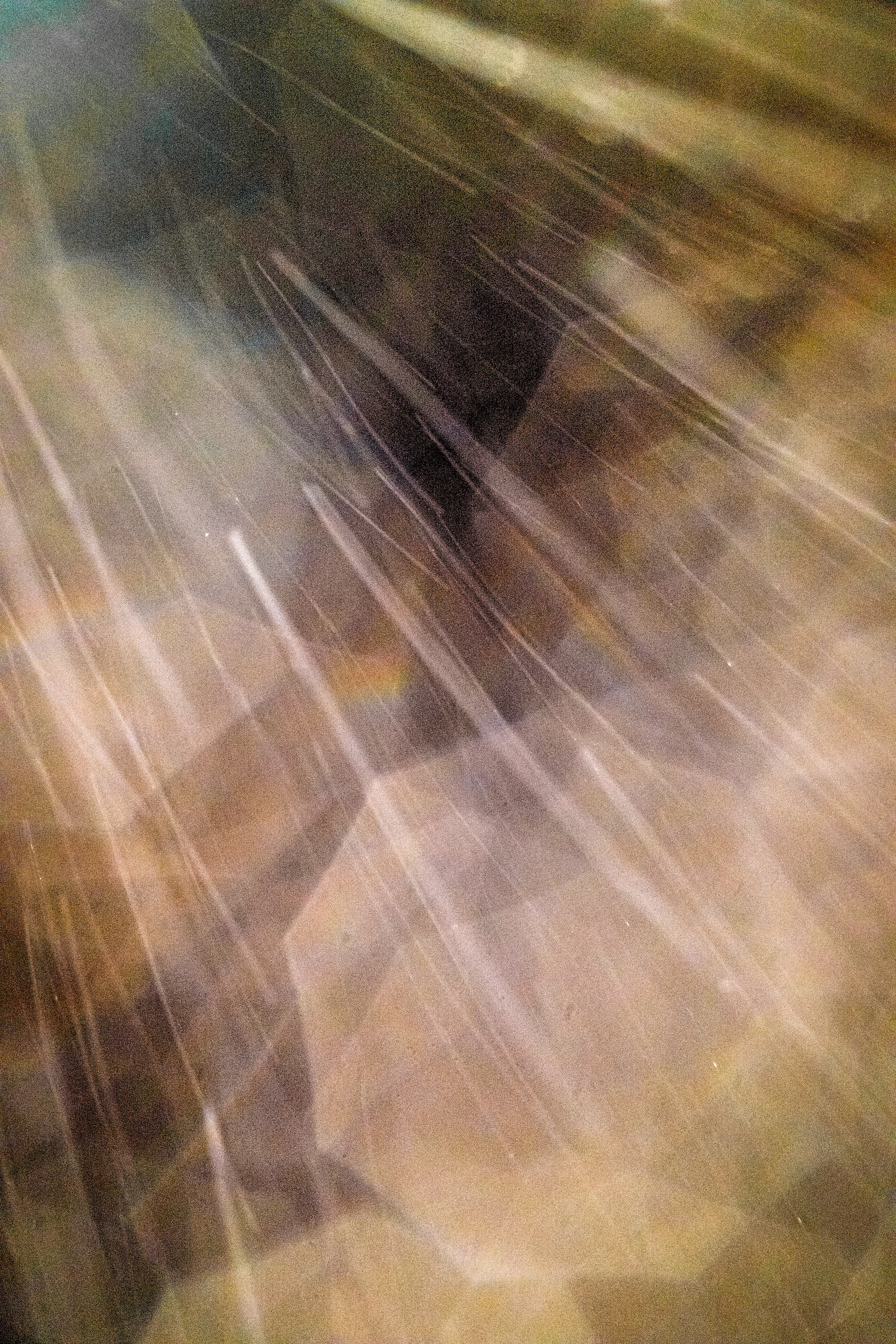 Peer into the looking glass of the SLURRIEST OF SEASONS. Photographic capture as physically generative action focuses into the light at the center of the storm. 