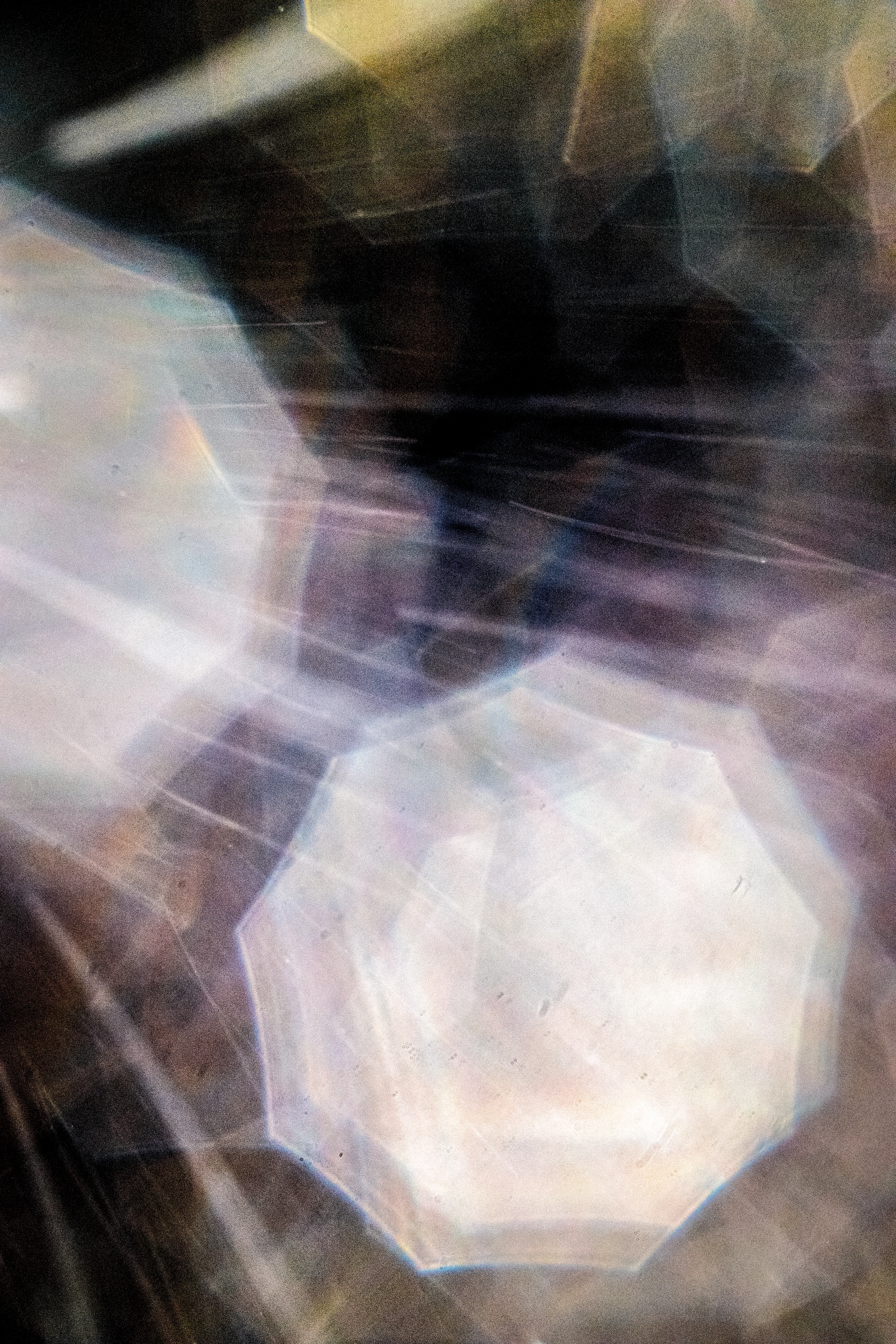 Peer into the looking glass of the SLURRIEST OF SEASONS. Photographic capture as physically generative action focuses into the light at the center of the storm. 