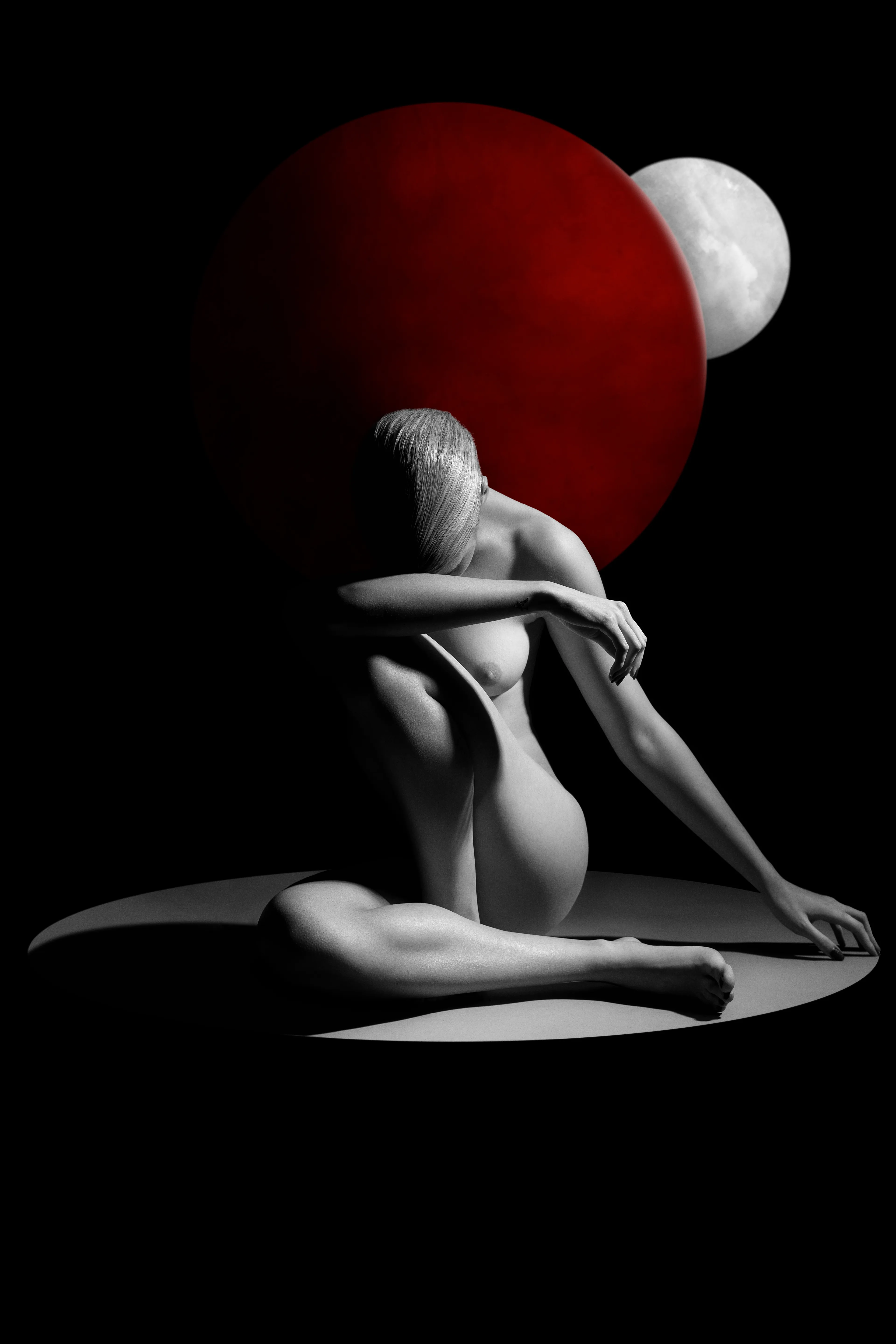 Nudeart photography.
When the moon behind a red planet,lights a woman sadness.
