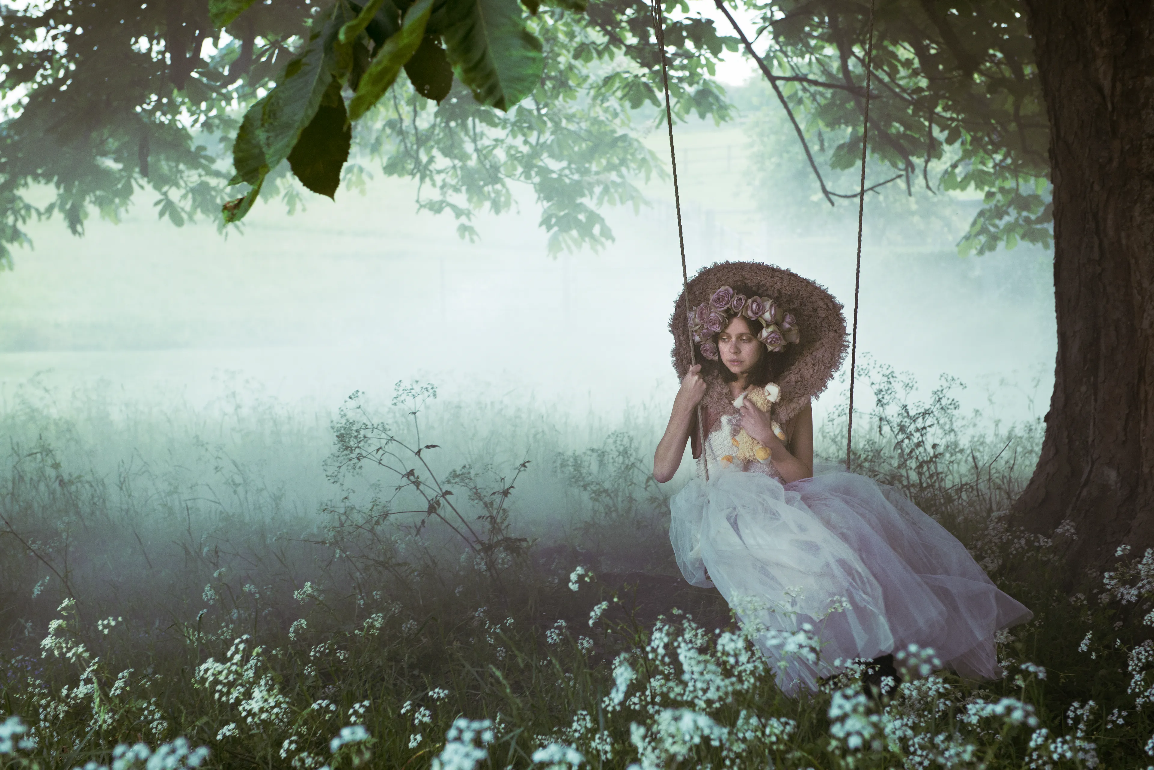 Featured in the story “Past The Lilacs, In The Clearing, Meet Me When It’s Dark” from The Endings, starring Bel Powley.

On the grounds of her parents’ home, an isolated young woman mourns the loss of her childhood love on the anniversary of his death. Each year she revisits the special places they had together, and the secret monument she built for him in the woods.
