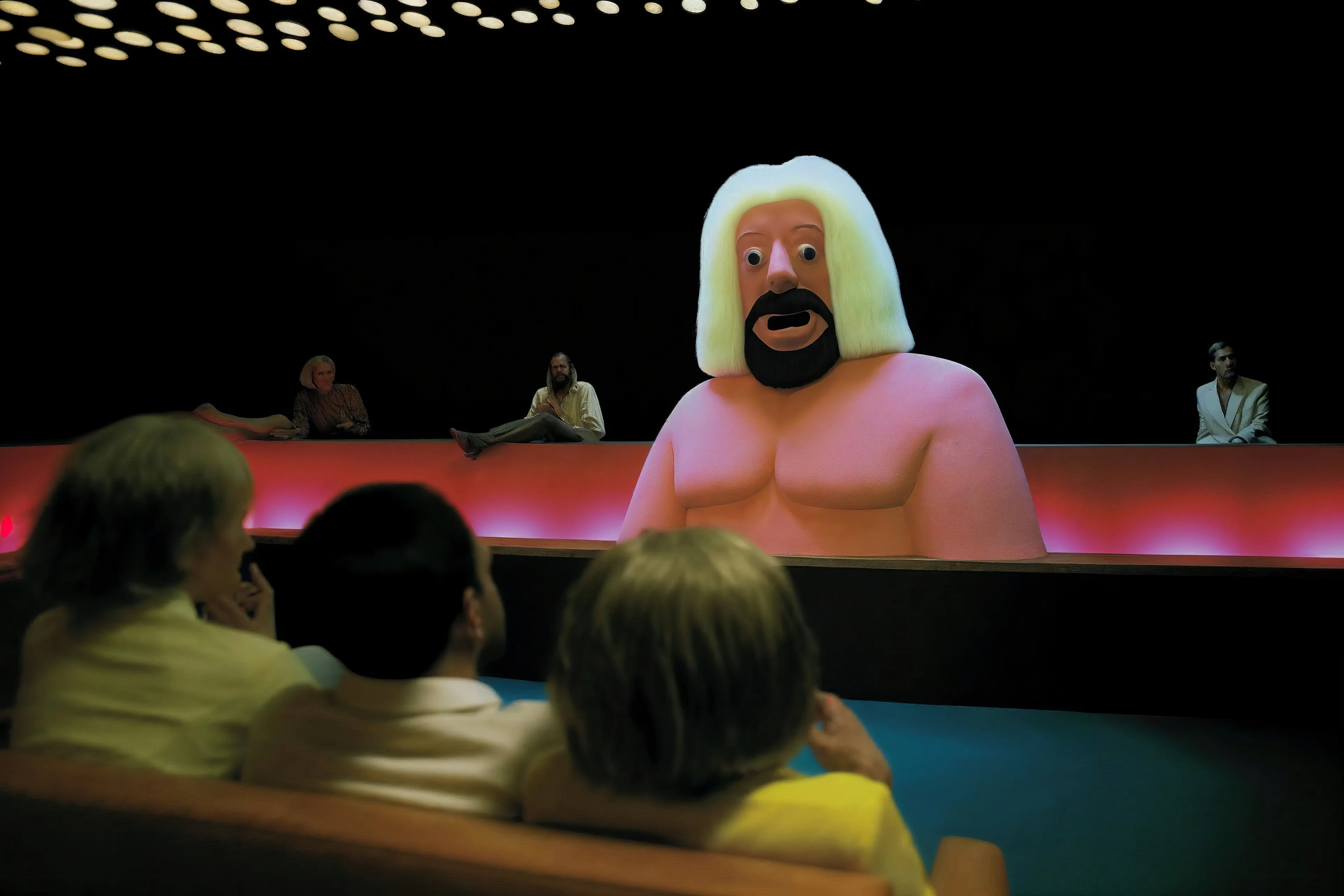A shirtless figure struggles in front of a crowd.