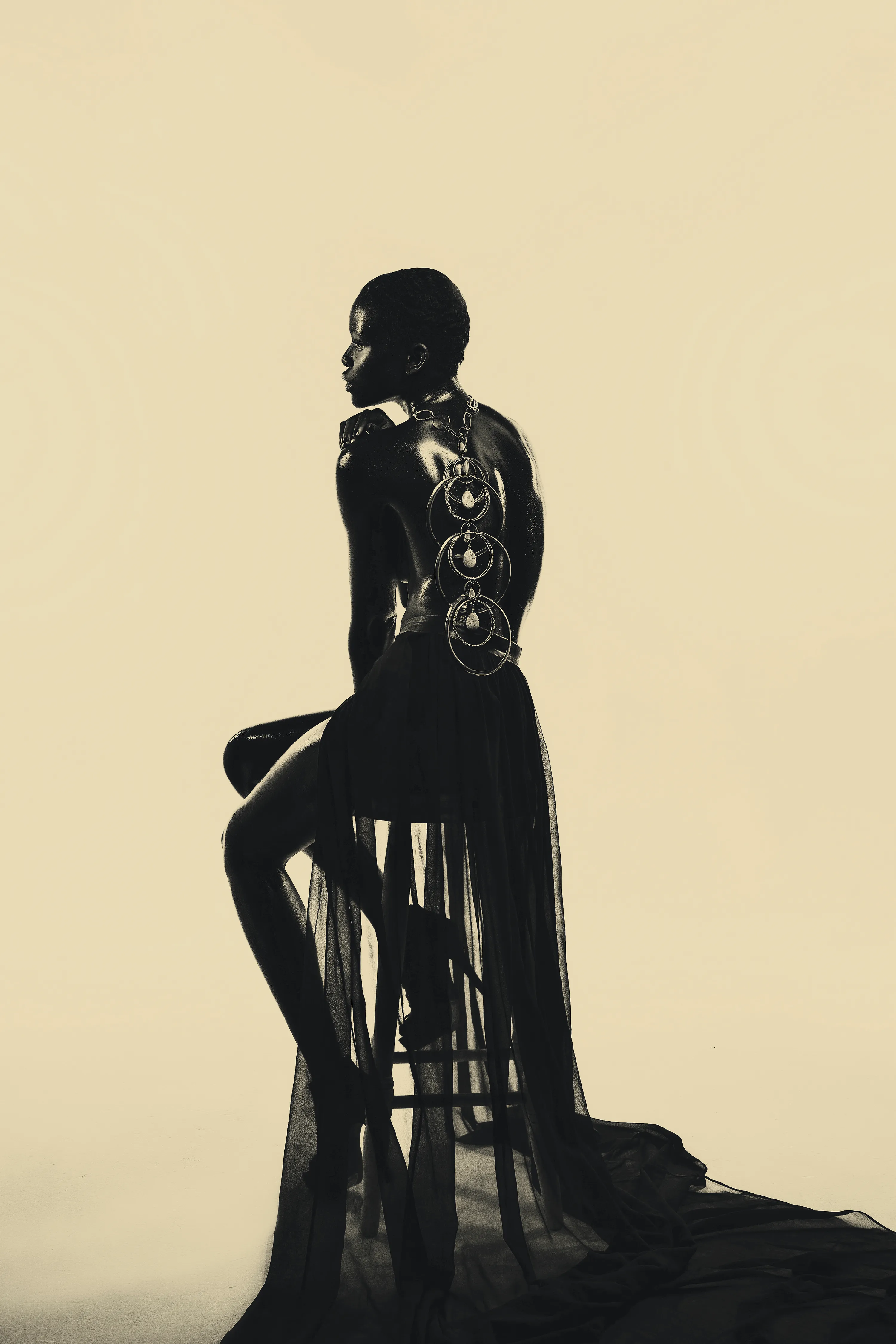 Lèhìn by Asiko

The Adorned Series by Asiko is a collection of 15 portraits exploring the mystical intersection of the artist’s Yoruba culture and the beauty of black womanhood. In this collection, Asiko uses a golden monochrome background to put the spotlight on the female model, adorned with traditional Yoruba attributes.  

Edition: 1/1 

Dimensions: 3000 × 4500