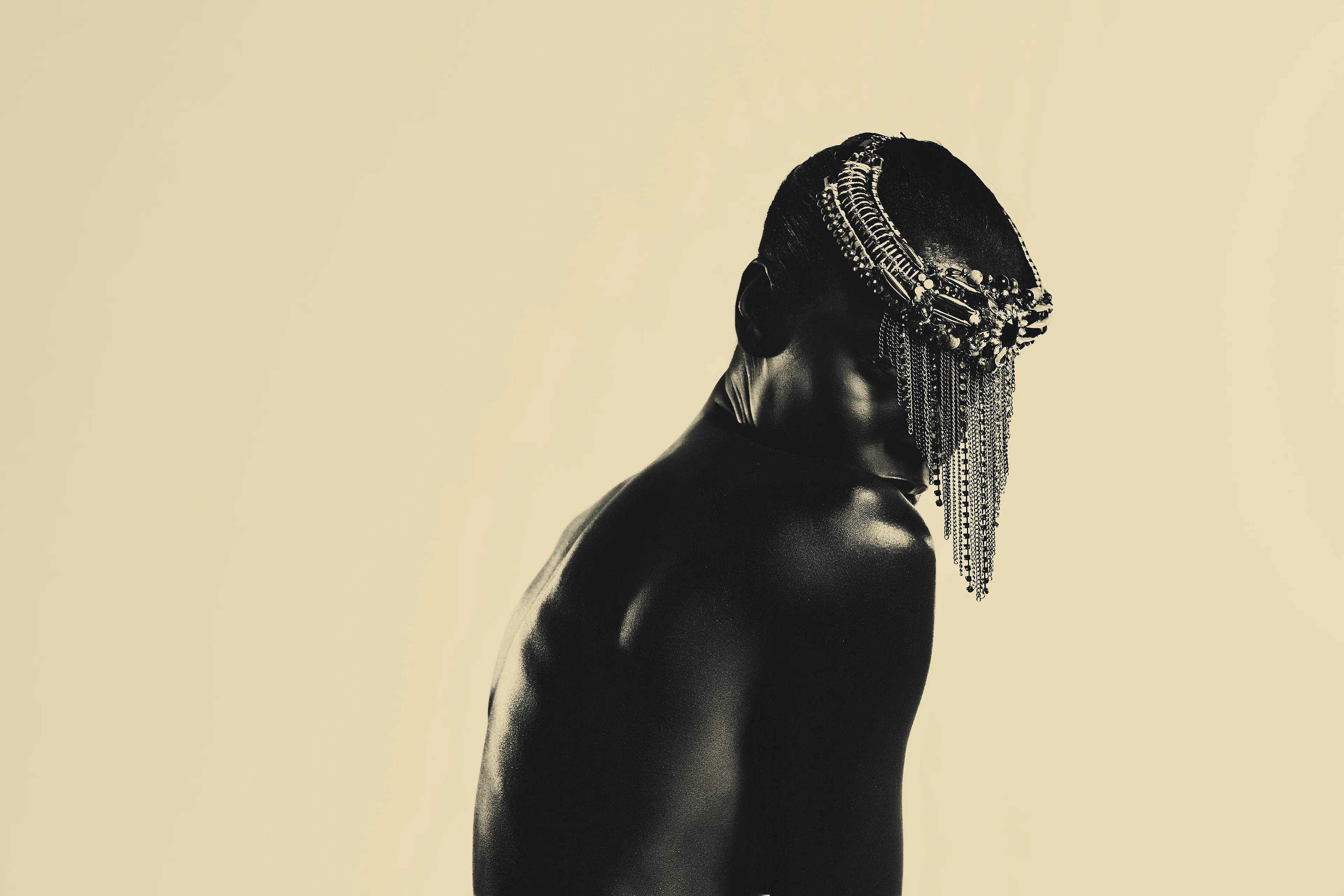 Boju by Asiko

The Adorned Series by Asiko is a collection of 15 portraits exploring the mystical intersection of the artist’s Yoruba culture and the beauty of black womanhood. In this collection, Asiko uses a golden monochrome background to put the spotlight on the female model, adorned with traditional Yoruba attributes.  

Edition: 1/1 

Dimensions: 4000x2667