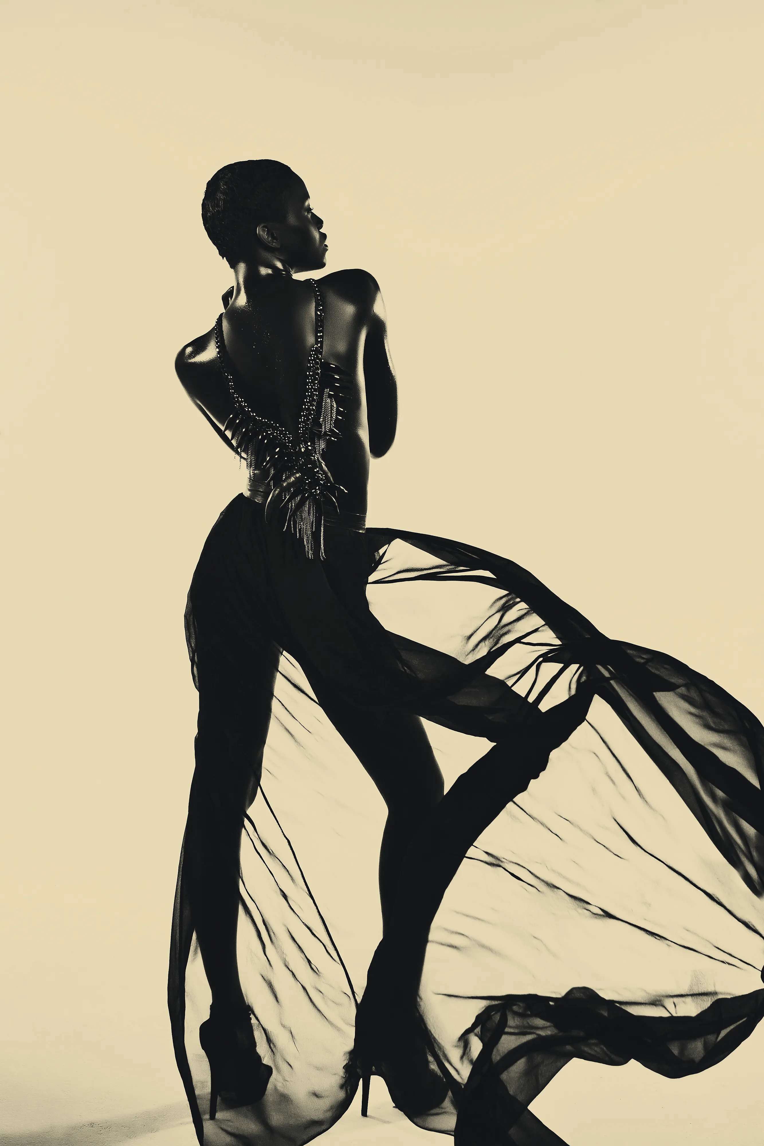 Destiny Moves the Wind by Asiko

The Adorned Series by Asiko is a collection of 15 portraits exploring the mystical intersection of the artist’s Yoruba culture and the beauty of black womanhood. In this collection, Asiko uses a golden monochrome background to put the spotlight on the female model, adorned with traditional Yoruba attributes.  

Edition: 1/1 

Dimensions: 2667x4000