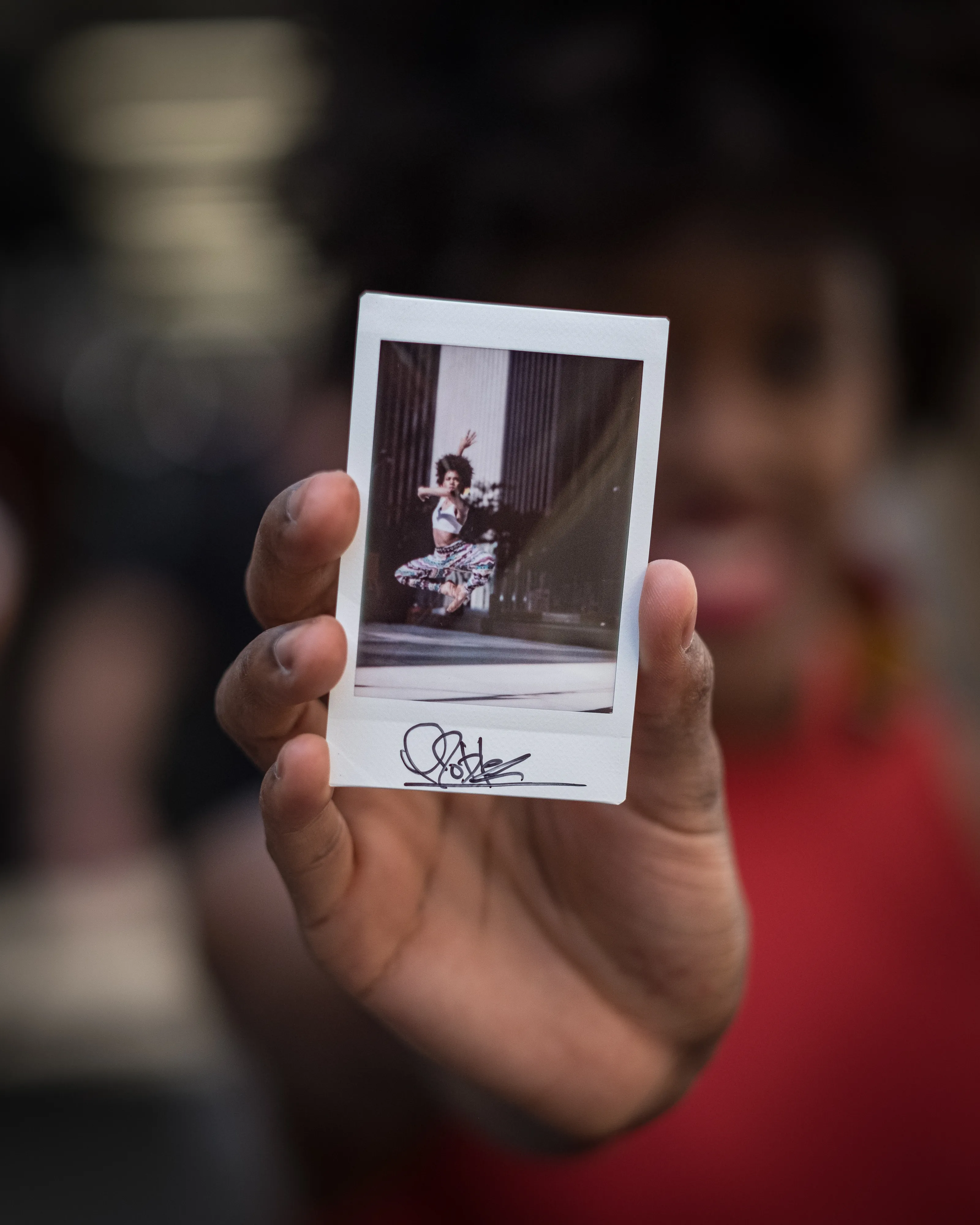 In 2013, I started a photography series that sought to inspire viewers to look at their urban surroundings in a new light. By featuring dancers in these settings, I aimed to challenge the way we perceive the spaces we encounter every day. Over the past nine years, this project has grown into a significant body of work that has shaped my career and opened up new opportunities for me. As a special gesture, I would often present the dancers with an instant photograph of our session together. Seeing their joy and pride in these mementos inspired me to start photographing them holding their instant prints. 'Dance Mementos' is a tribute to this ongoing series, showcasing a selection of my favorite images portraying the dancers with their photographs.