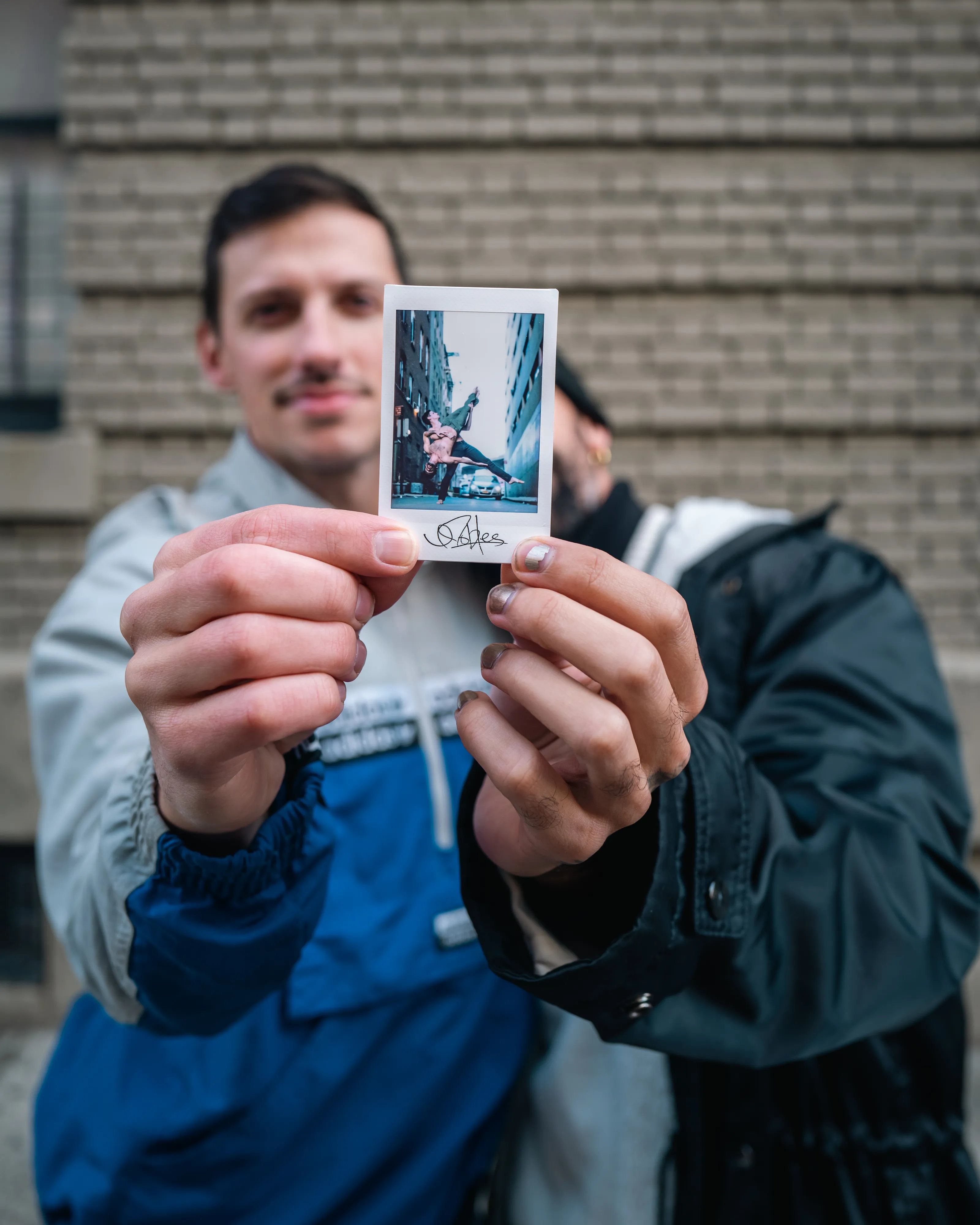 In 2013, I started a photography series that sought to inspire viewers to look at their urban surroundings in a new light. By featuring dancers in these settings, I aimed to challenge the way we perceive the spaces we encounter every day. Over the past nine years, this project has grown into a significant body of work that has shaped my career and opened up new opportunities for me. As a special gesture, I would often present the dancers with an instant photograph of our session together. Seeing their joy and pride in these mementos inspired me to start photographing them holding their instant prints. 'Dance Mementos' is a tribute to this ongoing series, showcasing a selection of my favorite images portraying the dancers with their photographs.