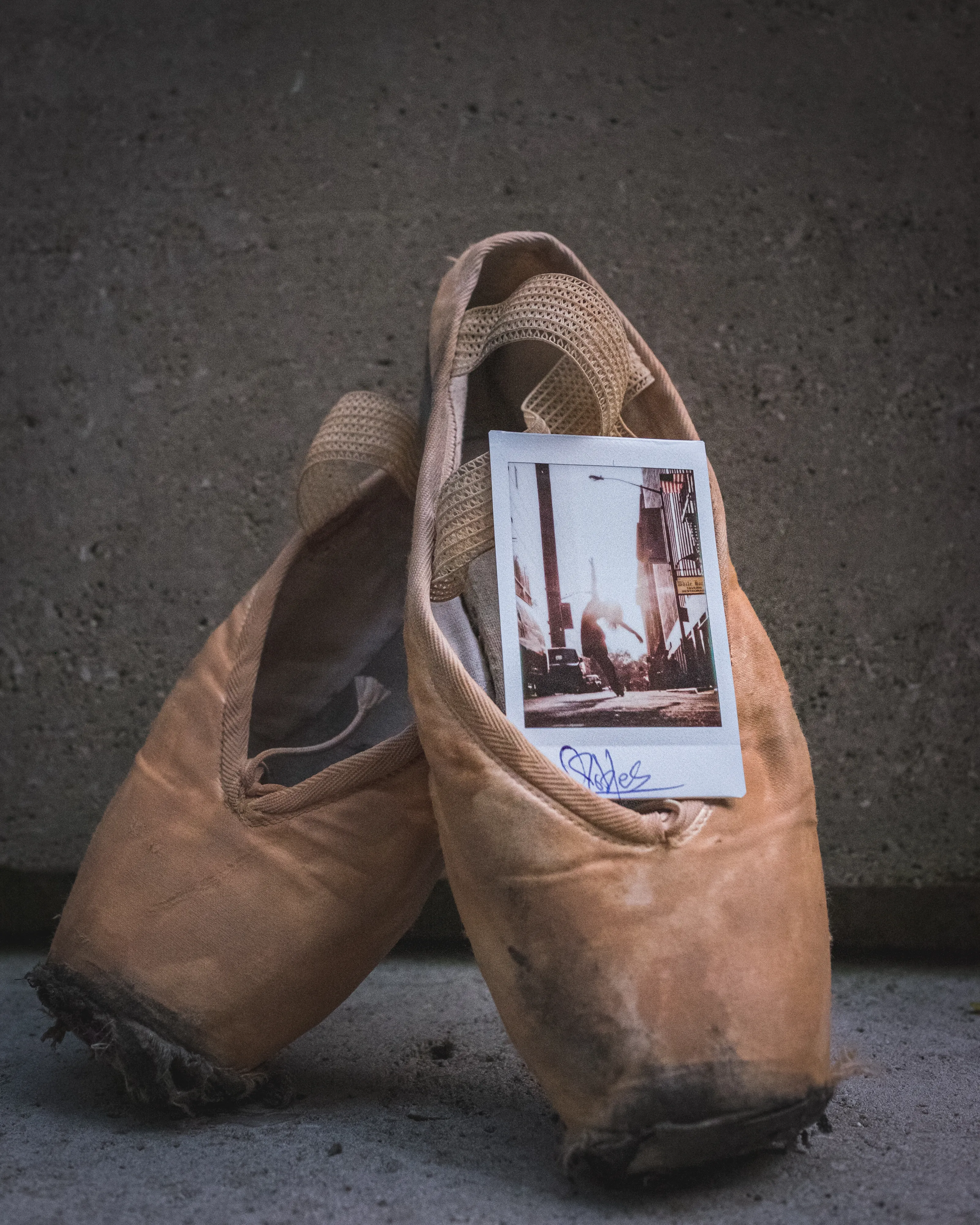 In 2013, I started a photography series that sought to inspire viewers to look at their urban surroundings in a new light. By featuring dancers in these settings, I aimed to challenge the way we perceive the spaces we encounter every day. Over the past nine years, this project has grown into a significant body of work that has shaped my career and opened up new opportunities for me. As a special gesture, I would often present the dancers with an instant photograph of our session together. Seeing their joy and pride in these mementos inspired me to start photographing them holding their instant prints. 'Dance Mementos' is a tribute to this ongoing series, showcasing a selection of my favorite images portraying the dancers with their photographs.