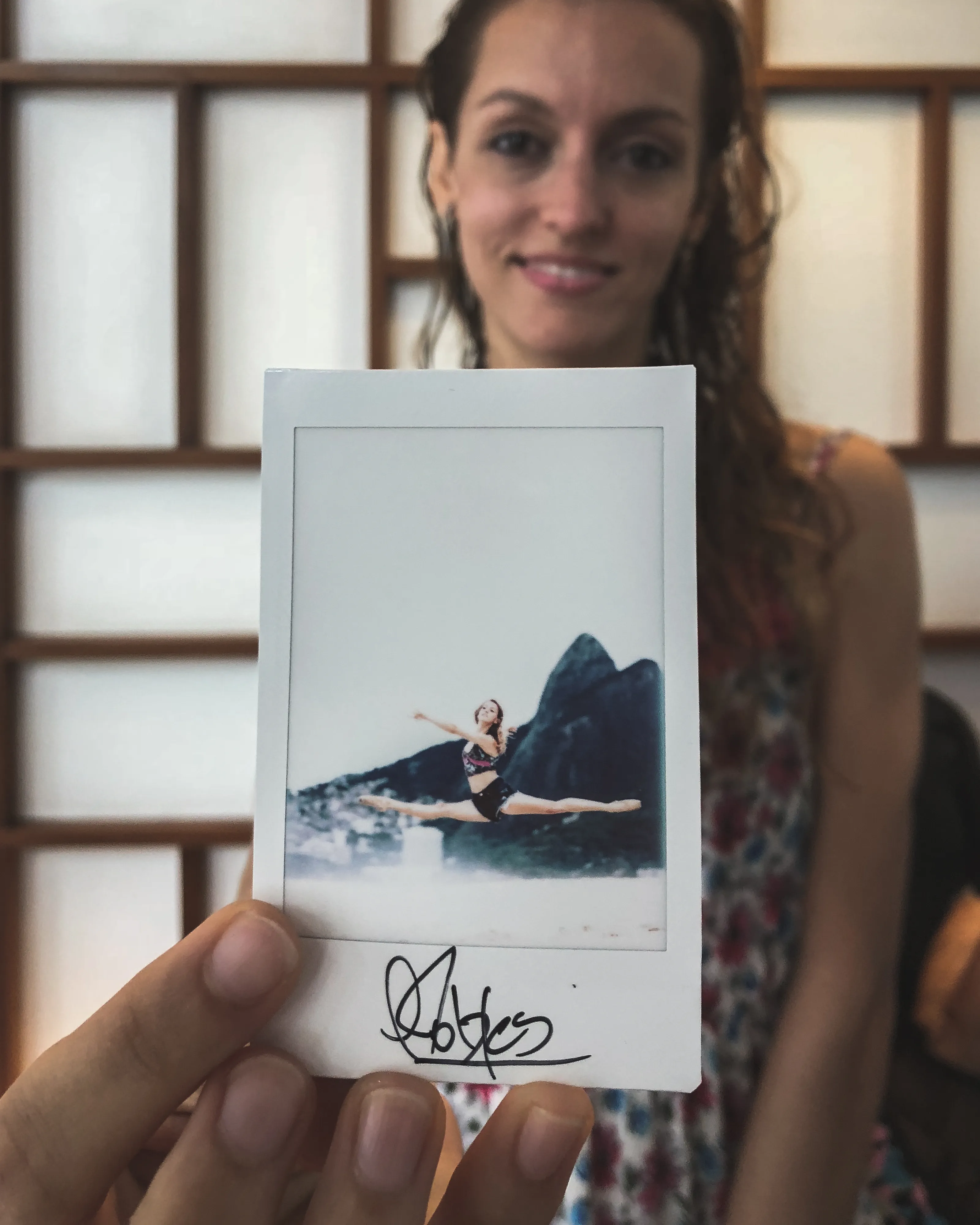 In 2013, I started a photography series that sought to inspire viewers to look at their urban surroundings in a new light. By featuring dancers in these settings, I aimed to challenge the way we perceive the spaces we encounter every day. Over the past nine years, this project has grown into a significant body of work that has shaped my career and opened up new opportunities for me. As a special gesture, I would often present the dancers with an instant photograph of our session together. Seeing their joy and pride in these mementos inspired me to start photographing them holding their instant prints. 'Dance Mementos' is a tribute to this ongoing series, showcasing a selection of my favorite images portraying the dancers with their photographs.