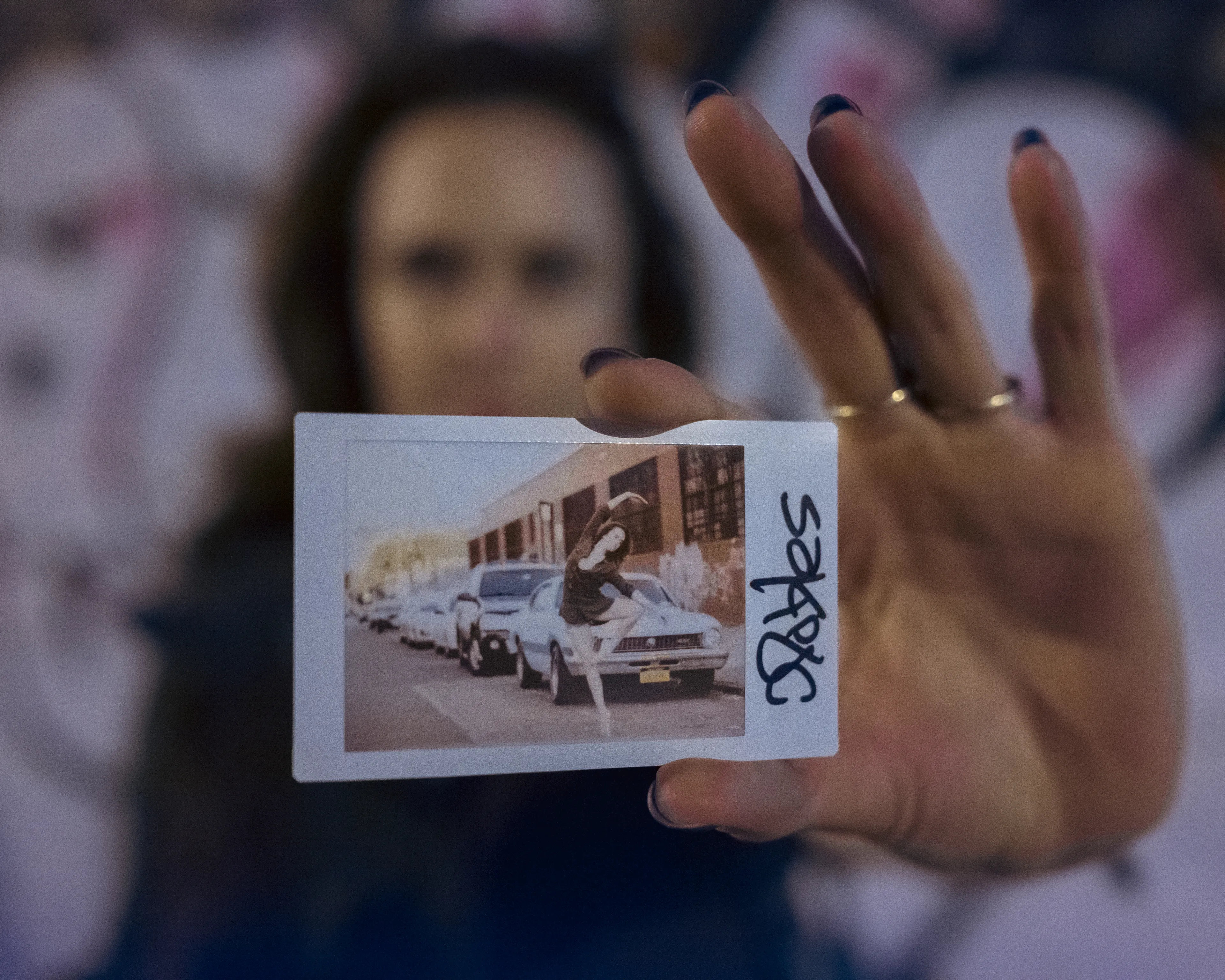 In 2013, I started a photography series that sought to inspire viewers to look at their urban surroundings in a new light. By featuring dancers in these settings, I aimed to challenge the way we perceive the spaces we encounter every day. Over the past nine years, this project has grown into a significant body of work that has shaped my career and opened up new opportunities for me. As a special gesture, I would often present the dancers with an instant photograph of our session together. Seeing their joy and pride in these mementos inspired me to start photographing them holding their instant prints. 'Dance Mementos' is a tribute to this ongoing series, showcasing a selection of my favorite images portraying the dancers with their photographs.