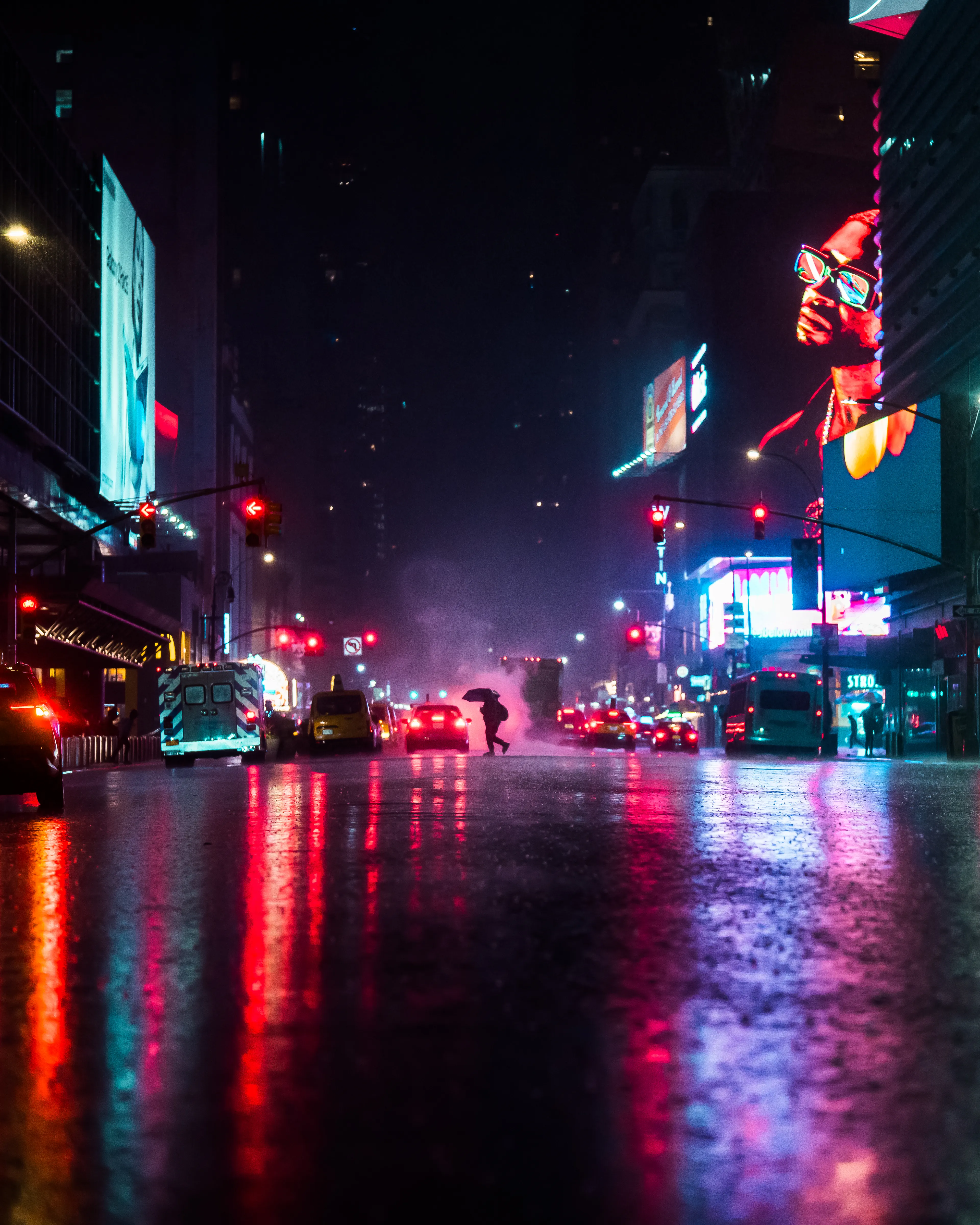 NIGHTMOVES is a 1/1/10, candid street photography collection from Dave Krugman that spans a decade of exploration of light in the neonoir setting of New York City by night. This collection is focused on the spectrum of artificial light against a natural dark, isolation in the density of the city, and the interplay of character and setting as found in these unstaged scenes. In these shadows, we can see ourselves, separated only by our luminous outlines. 

As soon as the sun sets in New York City, the world of night emerges. Darkness envelops the streets, and, one by one, the lights flicker on to push against the shadows. Shades move like ghosts through this continuum- shifting, blocking, bending light- like spirits projected from some distant realm who fade away as fast as you first saw them.  Every scene a stage for our shared story- motion at midnight, frozen in time, held still for just this instant- from dusk ‘til dawn is NIGHTMOVES