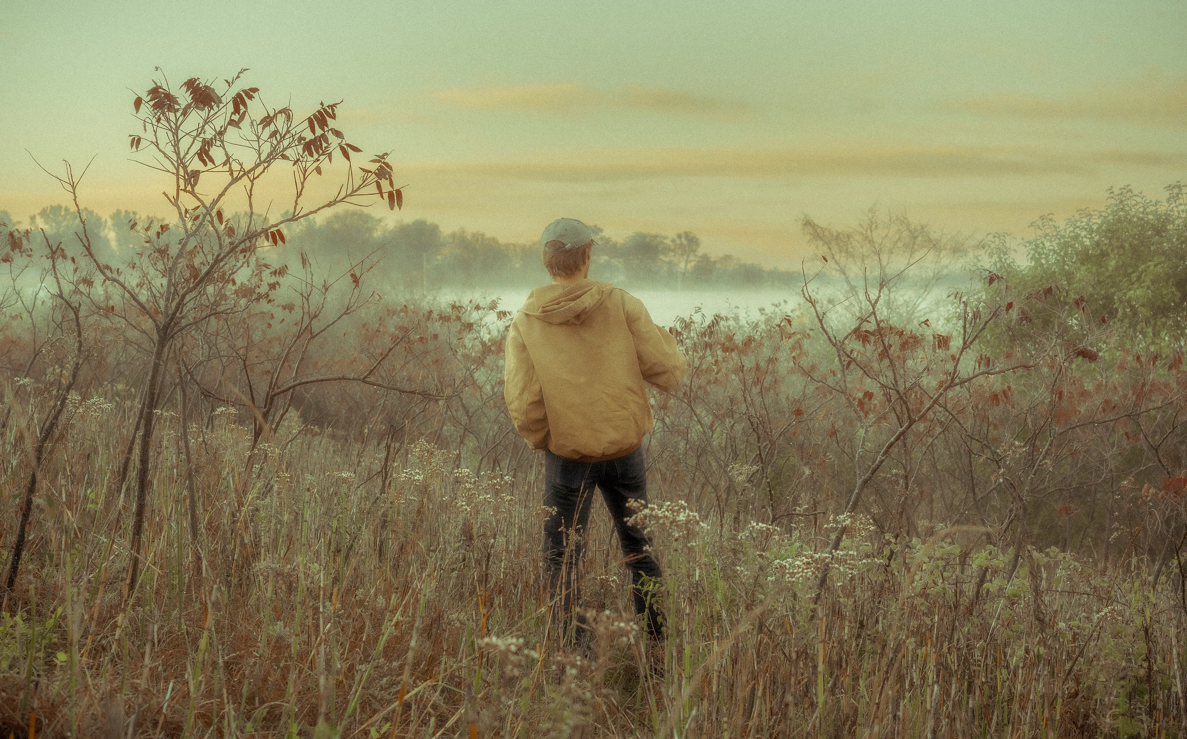 The Silent Hunt #2 The Fight for Bell Bowl Prairie by Summer Wagner

Bradley silently walks through the ancient old growth Bell Bowl Prairie, one of the most endangered habitats in the world, as it awaits destruction at the hands of an airport expansion plan in Rockford, IL. 

The Silent Hunt explores the quiet search for connection, intimacy, and ways to cope during the last two years of an international pandemic. Peering specifically into the lives of boys and men of at least three different generations, The Silent Hunt demonstrates an earnest search for belonging and duty in an increasingly atomized world. 

Edition: 1 of 1

Commissioned by Obscura