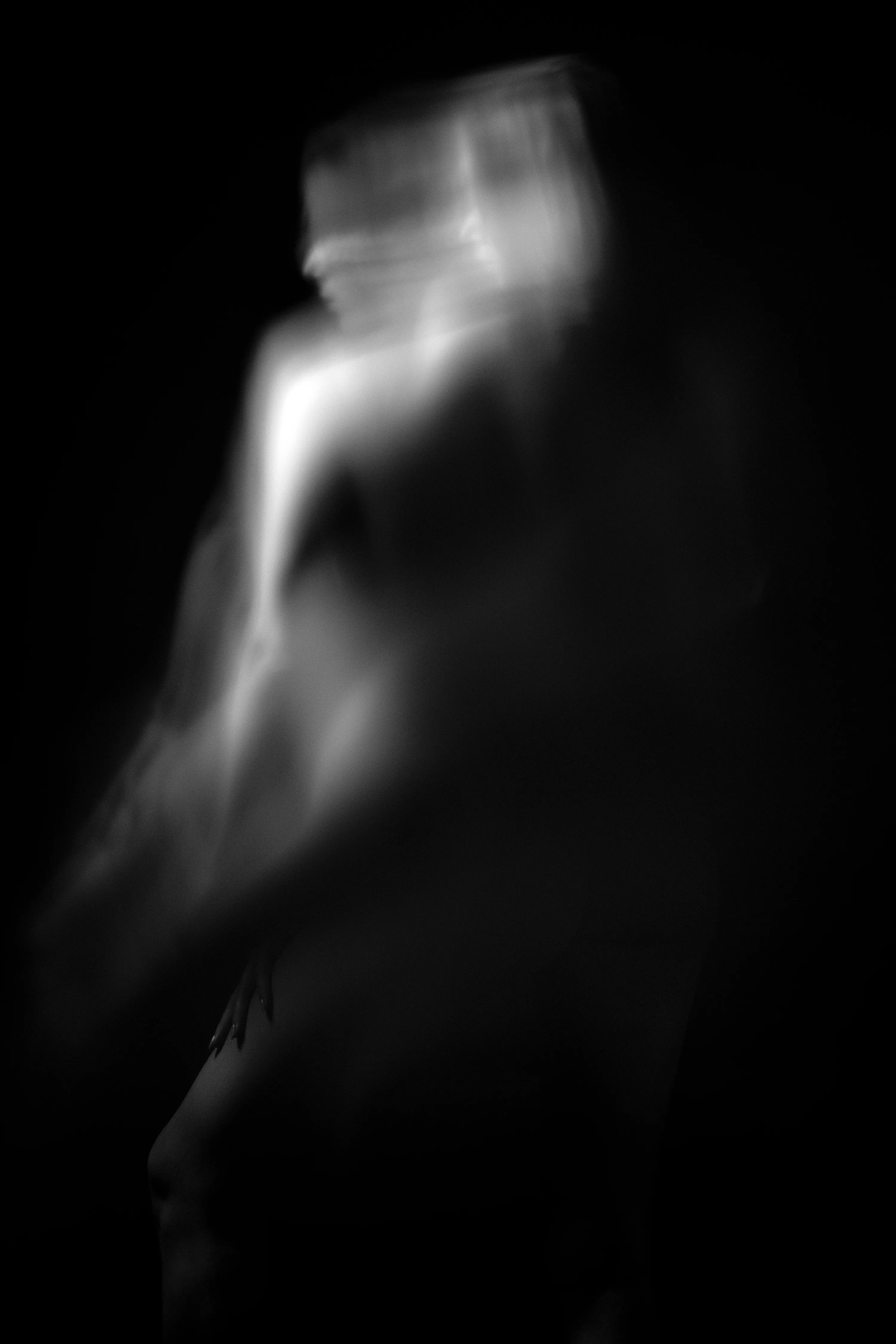 Figure Studies is a series of nude portraits that subverts the viewer’s expectations of the female form. Shot through glass, the images are distorted, even ghost-like. Though strange and unsettling, the forms remain familiar and beautiful. Light finds the bodies in the dark while holding the viewer at arm’s length, as if seen through a veil. 

Part of Caitlin Cronenberg’s Figure Studies collection. 
