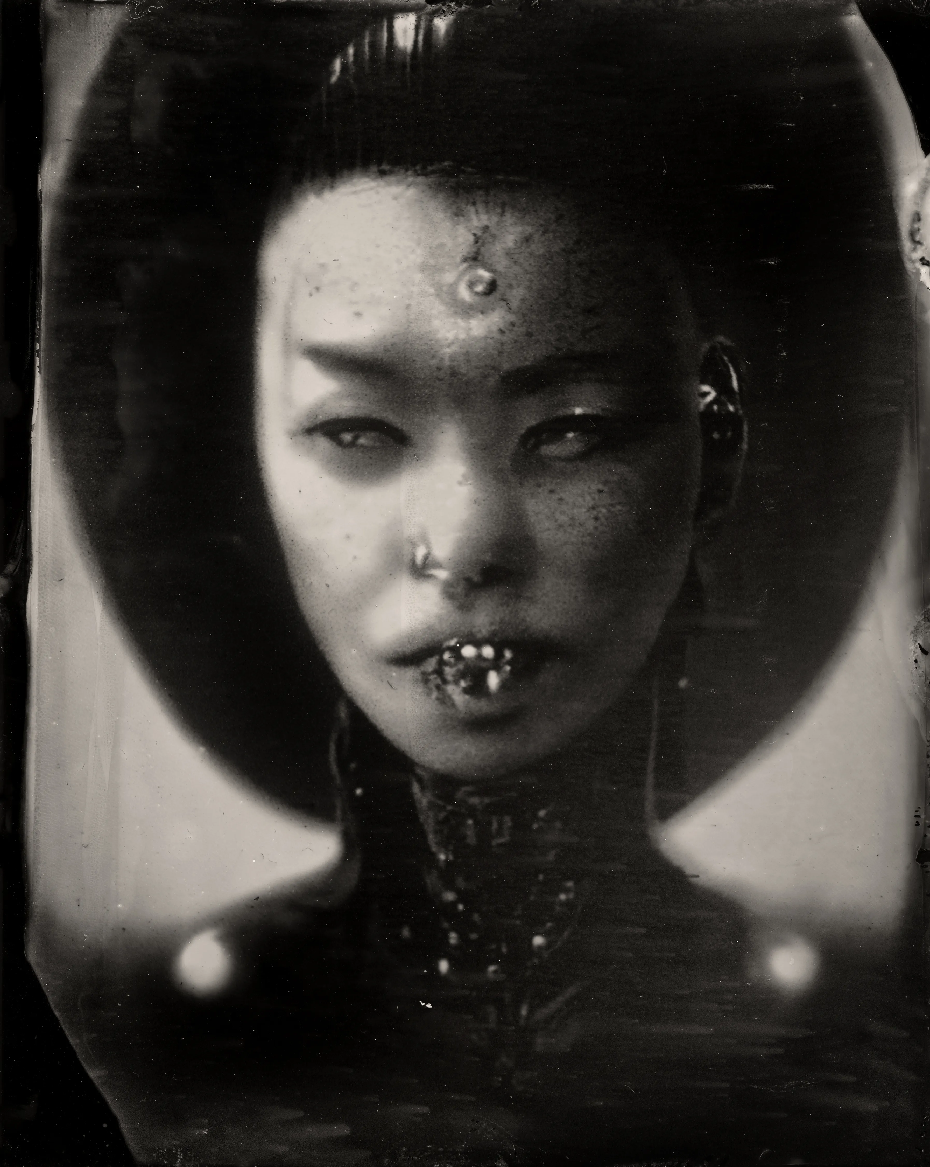 ai_001 is the first AI generated image transferred onto Wet Plate Collodion. Wet Plate Collodion is one of the earliest forms of chemical photography ever discovered in the 1850s. This contact is bringing together the deep past and the far future by fusing AI + Alchemy. 


Wet Plate Collodion is traditionally used in antique portraiture. Now with the darkroom emergence of ai_001 we can look at our future through this historic process blurring the borders of time and space. 


1/1  
ZEITWEITZ  
2022

Generative AI, Wet Plate Collodion  
3588 px x 4500 px  
jpg
