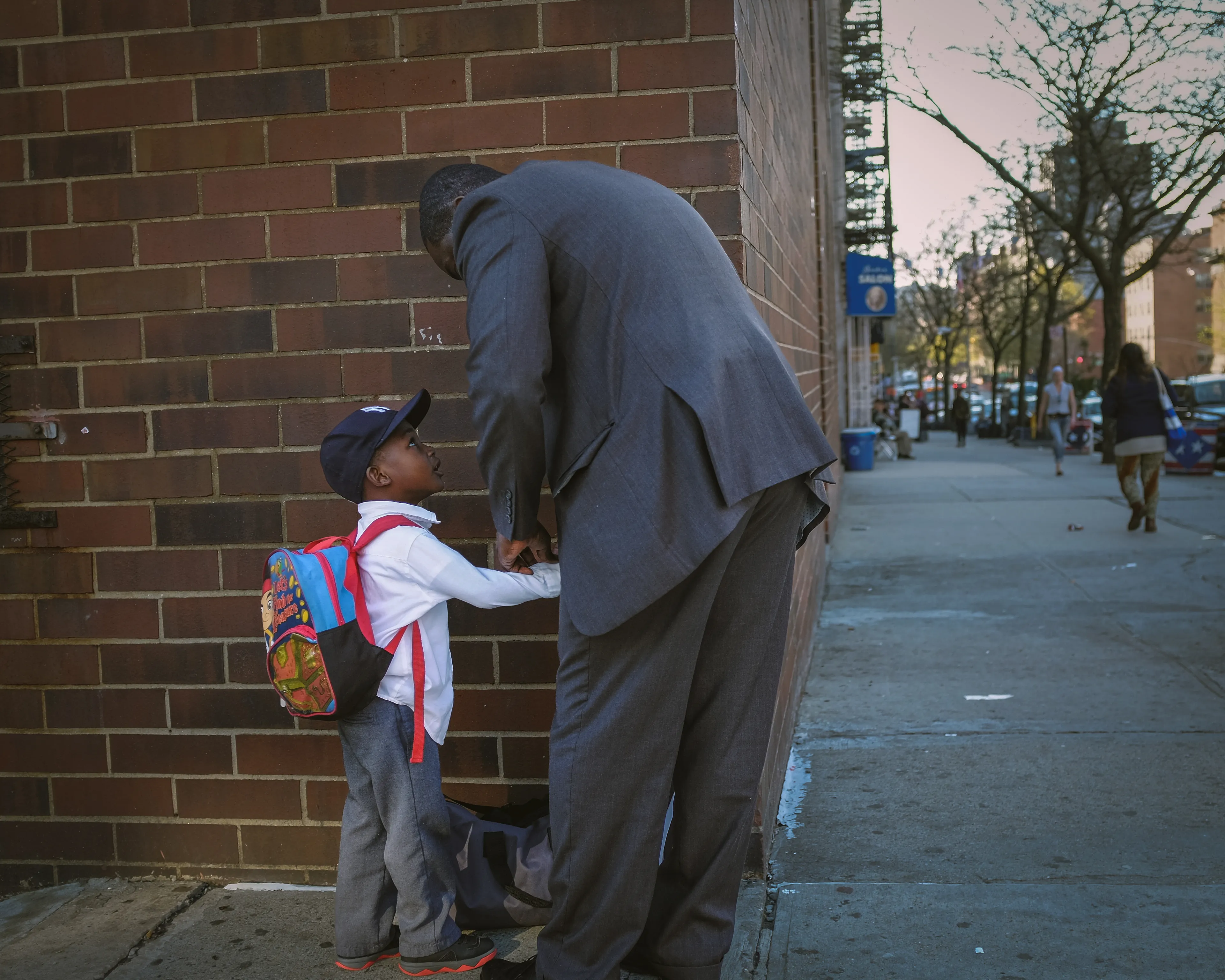 May 1, 2014

City-Dads:

As I roam the City streets, with my camera in hand, I find myself lost on this concrete playground. Everything is so big, larger than life. And in a snap, I am once again a child. Playful and unstoppable, just like when I played superheroes.

Yet, at the same time, I feel so vulnerable and scared inside. Afraid of stumbling upon a demon in some unforeseen corner of my mind. Then, I remember your figure, I can see you all around. Your melodic voice and gregarious smile. But it is just a mirage. You are back home, and I am a grown man, capable of facing the world on his own. Still, if you only knew how much I wish you were here, to play with me, to protect me, or just to be by my side right now…Dad.