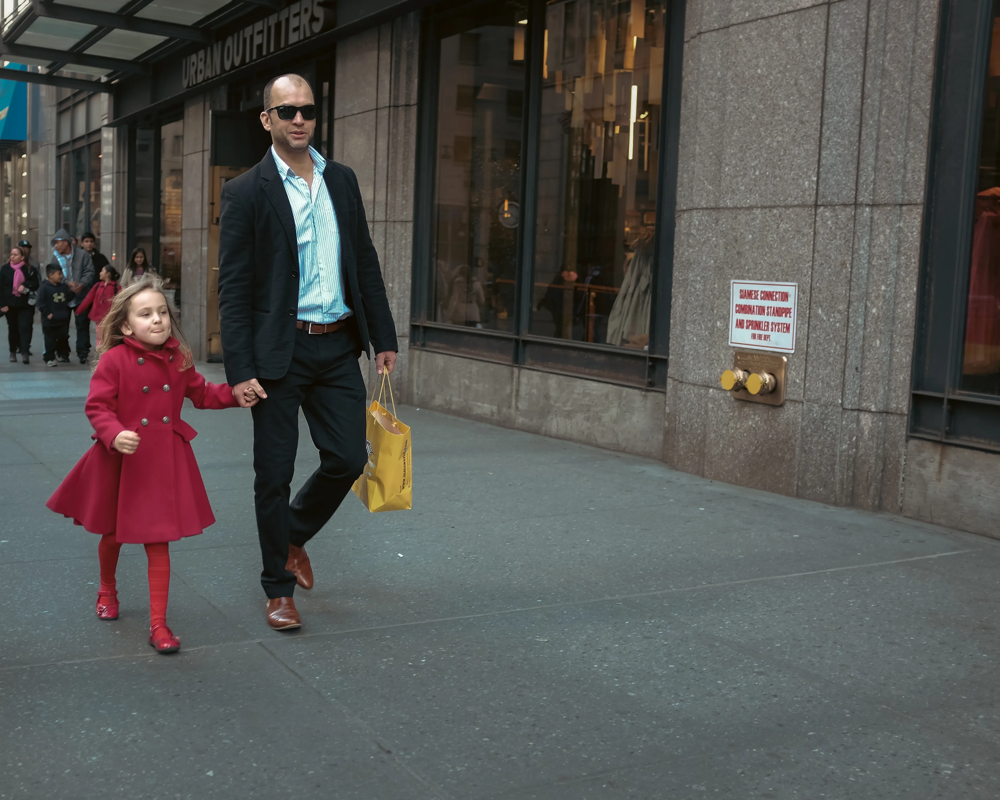 April 4, 2015

City-Dads:

As I roam the City streets, with my camera in hand, I find myself lost on this concrete playground. Everything is so big, larger than life. And in a snap, I am once again a child. Playful and unstoppable, just like when I played superheroes.

Yet, at the same time, I feel so vulnerable and scared inside. Afraid of stumbling upon a demon in some unforeseen corner of my mind. Then, I remember your figure, I can see you all around. Your melodic voice and gregarious smile. But it is just a mirage. You are back home, and I am a grown man, capable of facing the world on his own. Still, if you only knew how much I wish you were here, to play with me, to protect me, or just to be by my side right now…Dad.