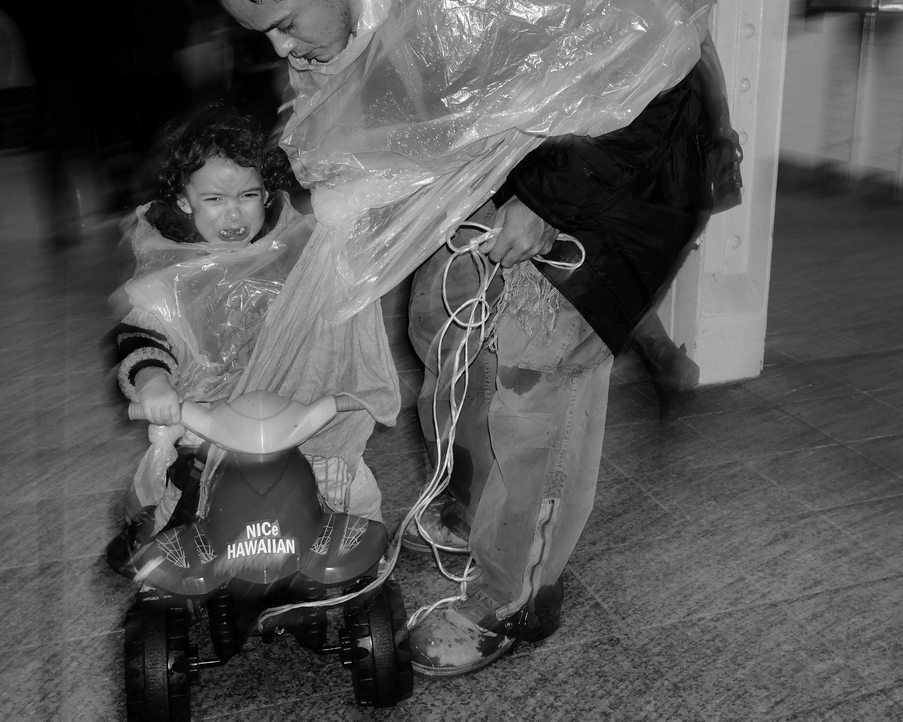 March 29, 2014

City-Dads:

As I roam the City streets, with my camera in hand, I find myself lost on this concrete playground. Everything is so big, larger than life. And in a snap, I am once again a child. Playful and unstoppable, just like when I played superheroes.

Yet, at the same time, I feel so vulnerable and scared inside. Afraid of stumbling upon a demon in some unforeseen corner of my mind. Then, I remember your figure, I can see you all around. Your melodic voice and gregarious smile. But it is just a mirage. You are back home, and I am a grown man, capable of facing the world on his own. Still, if you only knew how much I wish you were here, to play with me, to protect me, or just to be by my side right now…Dad.