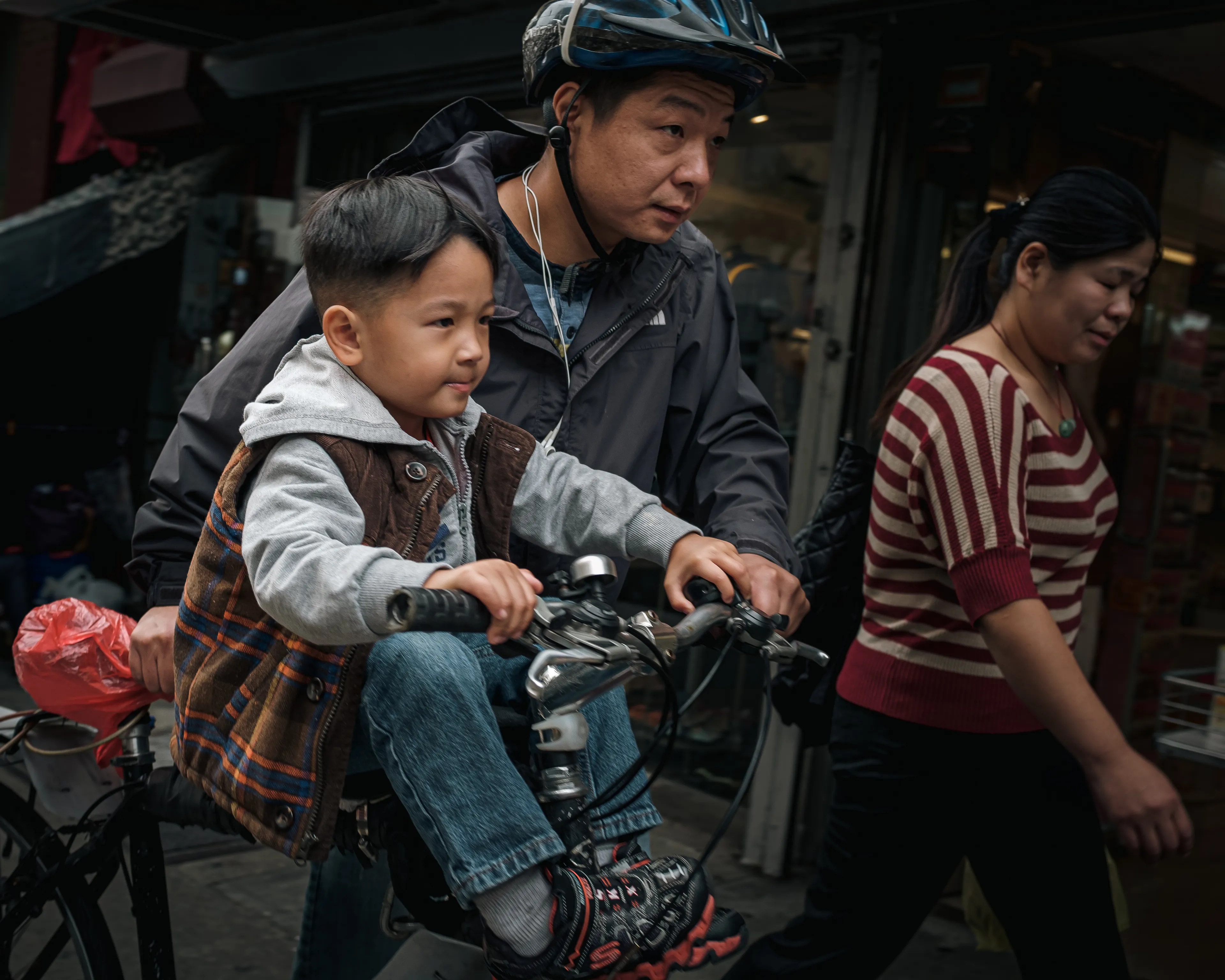 October 16, 2013

City-Dads:

As I roam the City streets, with my camera in hand, I find myself lost on this concrete playground. Everything is so big, larger than life. And in a snap, I am once again a child. Playful and unstoppable, just like when I played superheroes.

Yet, at the same time, I feel so vulnerable and scared inside. Afraid of stumbling upon a demon in some unforeseen corner of my mind. Then, I remember your figure, I can see you all around. Your melodic voice and gregarious smile. But it is just a mirage. You are back home, and I am a grown man, capable of facing the world on his own. Still, if you only knew how much I wish you were here, to play with me, to protect me, or just to be by my side right now…Dad.