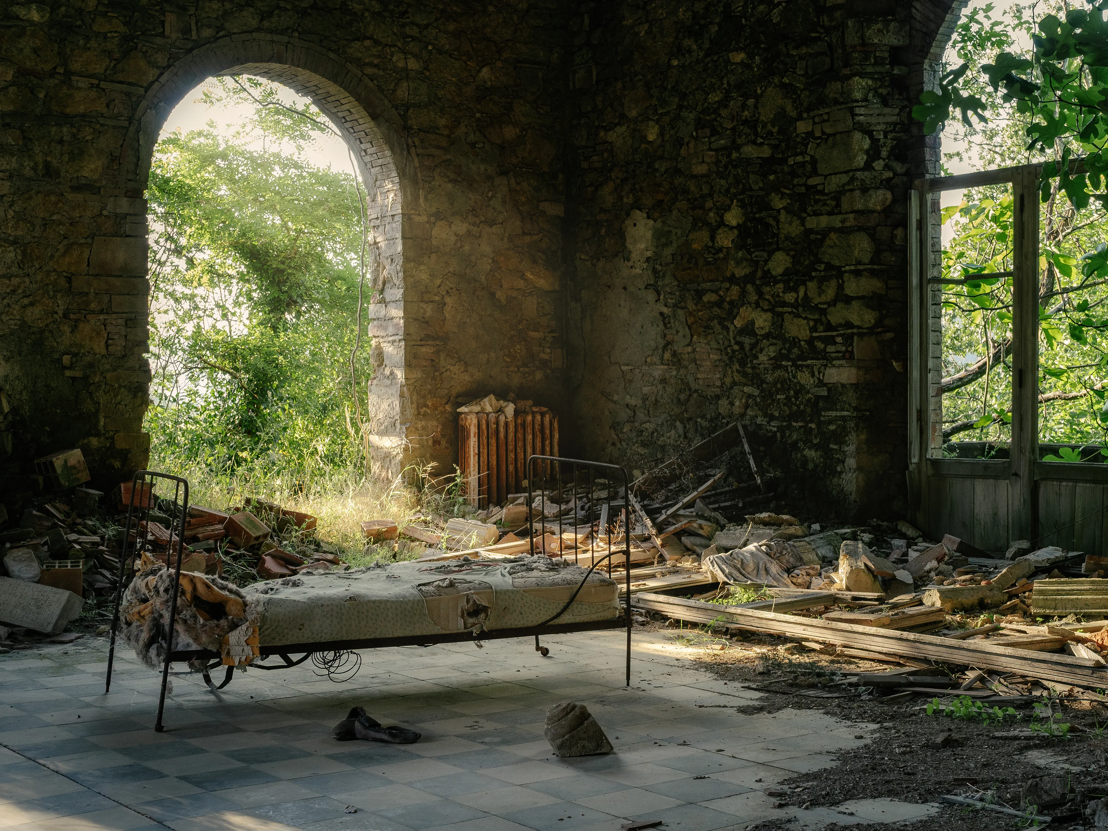 An empty bed,
but the light still knows where to fall.
Sometimes, the ruins hold more kindness
than the walls ever did.