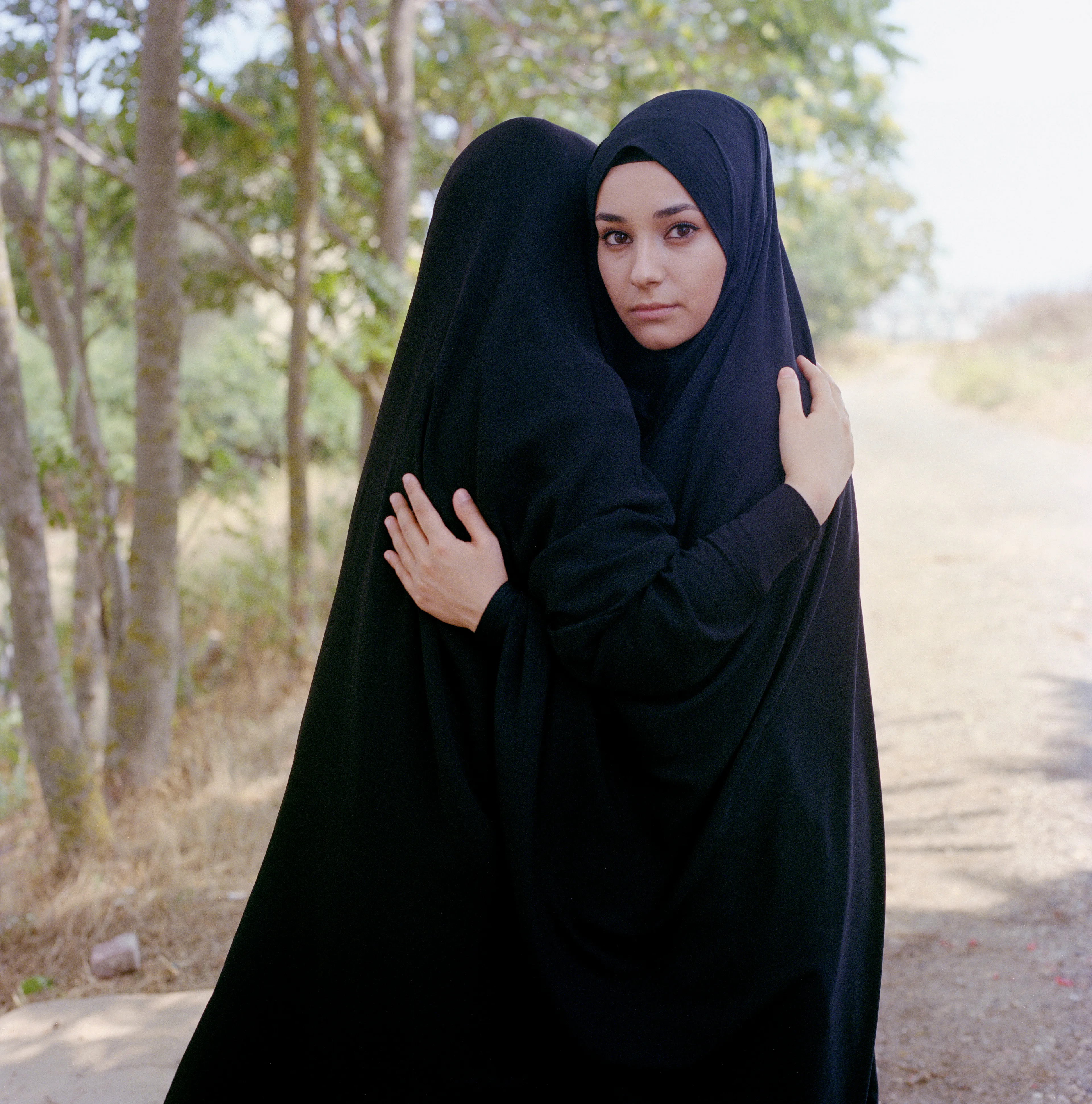 Magnum 75 #55 by Sabiha Çimen. Istanbul, Turkey. 2018  
Nehir (18) embraces her soulmate at a picnic.

The Magnum 75 collection is the inaugural NFT collection by Magnum Photos. Created in 2022, the collection brings together works by 76 photographers taken across seven decades. 

Each drop will be curated in dialogue with three leading picture editors from across the globe and selected to embody the agency’s past, present, and future. This collection release coincides with the agency’s 75th celebrations and its Annual General Meeting in New York. 

The first collection has been curated by Alejandro Cartagena, co-founder of Obscura.

Alejandro Cartagena said: "To look into Magnum’s vast archive is to look into the evolving history of photography as a language. For this selection, which marks the first steps of the agency into yet another horizon for photography with the emergence of blockchain technology, I decided to focus on the ingredients that make certain images stand out from the rest – the elements that all photographers should be aiming for. These 76 images celebrate not only the endurance of Magnum Photos but the quality that has made this longevity possible."

Edition: 1 of 1

© Sabiha Çimen/Magnum Photos 2022 All Rights Reserved  
www.magnumphotos.com/terms-conditions/