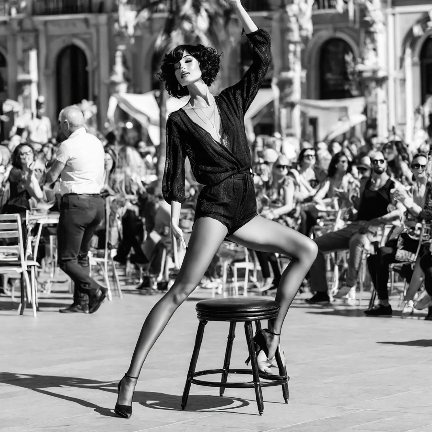 In the heart of Madrid's bustling town square, a woman takes to the cobblestone stage with grace and poise, her movements fluid and effortless as she captivates the gathered crowd. Bathed in the warm glow of the afternoon sun, she becomes a vision of elegance and beauty, her presence commanding the attention of all who are fortunate enough to witness her performance. With each step and gesture, she tells a story, weaving a tale of passion and expression through the language of dance. Against the backdrop of historic architecture and the lively energy of the city, the woman's performance becomes a timeless masterpiece, a testament to the enduring allure of Madrid's vibrant culture and artistic spirit.